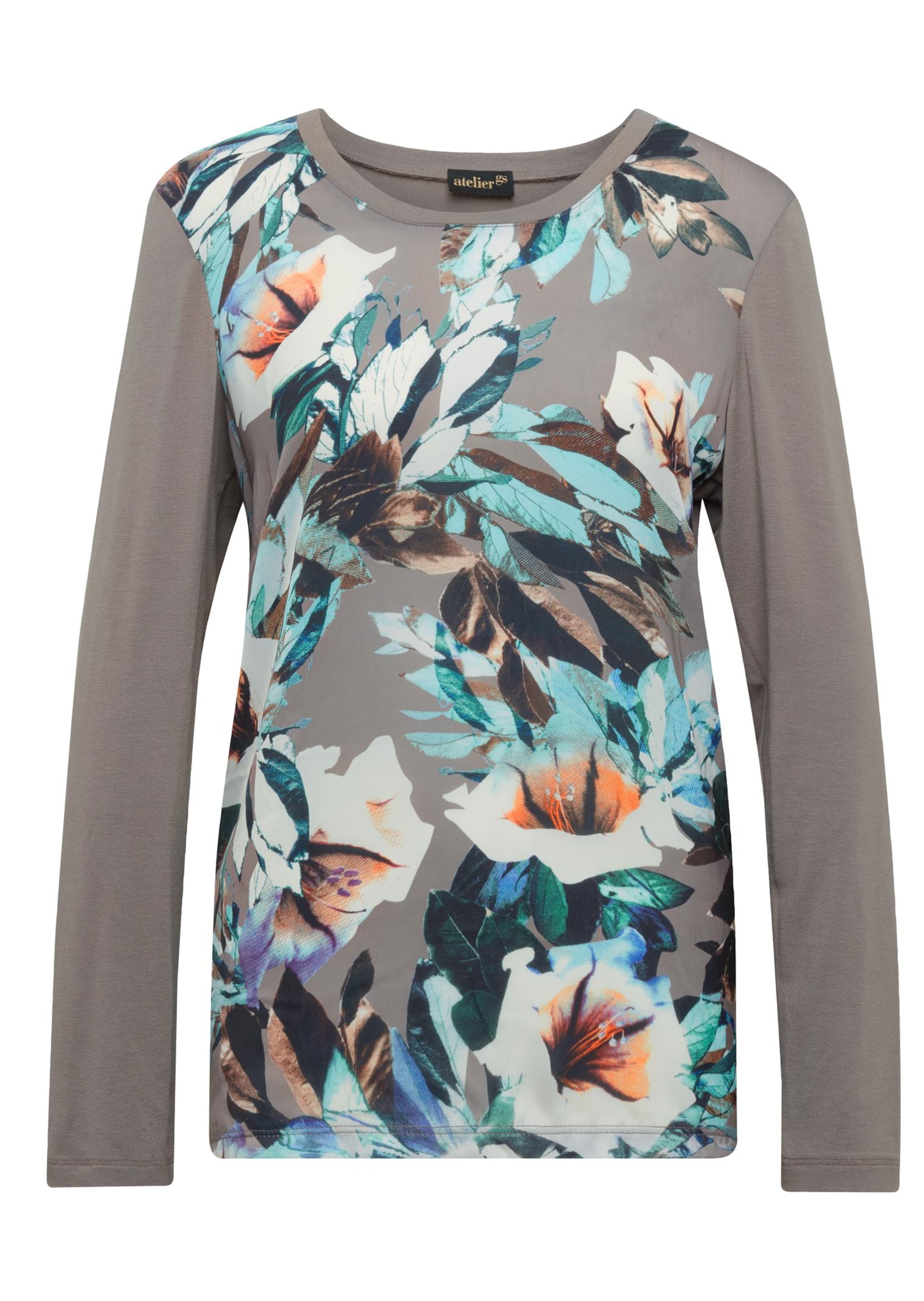 Elégante blouse imprimée en mélange de matières