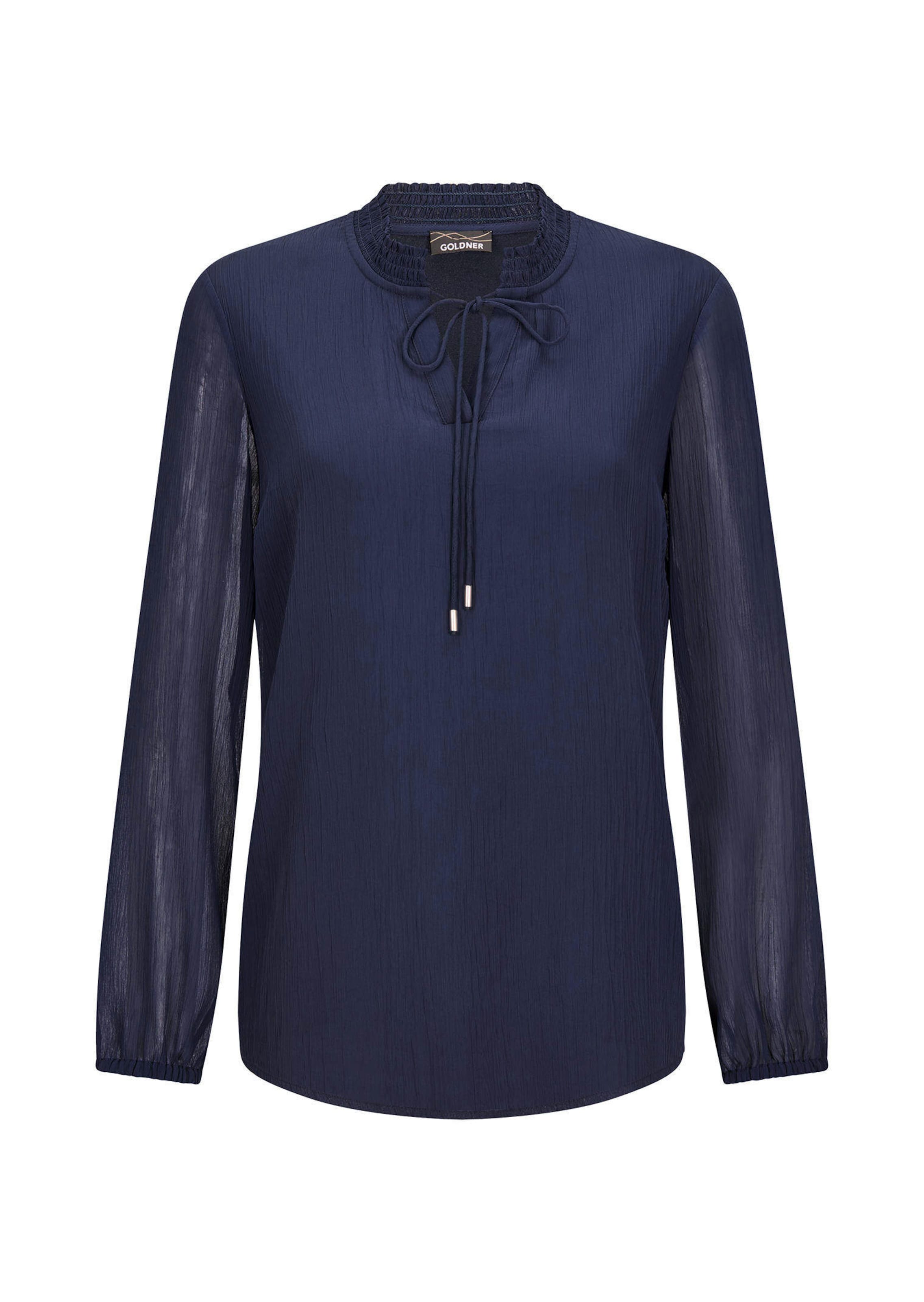 Chemisier en mousseline avec encolure féminine