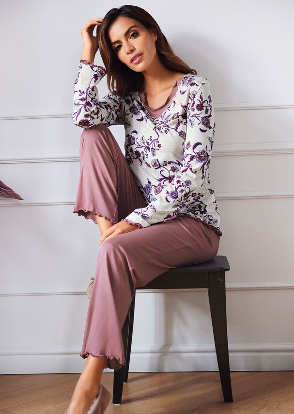 Pyjamas with floral print and decorative wavy hem