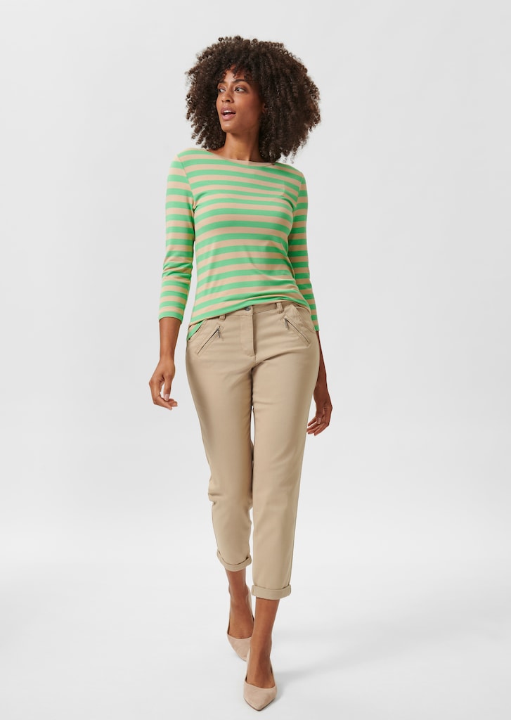 Cropped trousers in a casual chino style 1