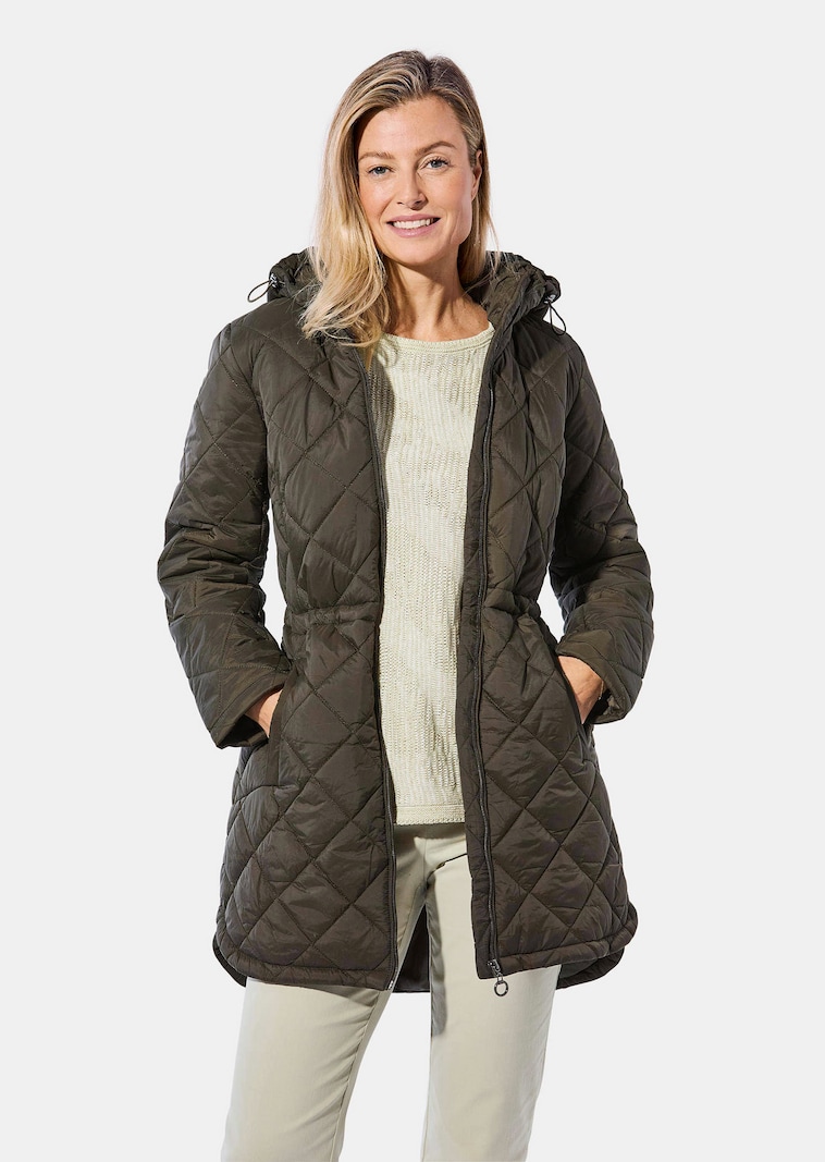 Veste matelassée avec base plus longue au dos