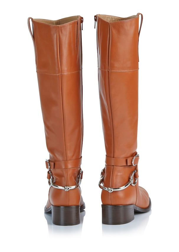 Leather boots with decorative clasps 1