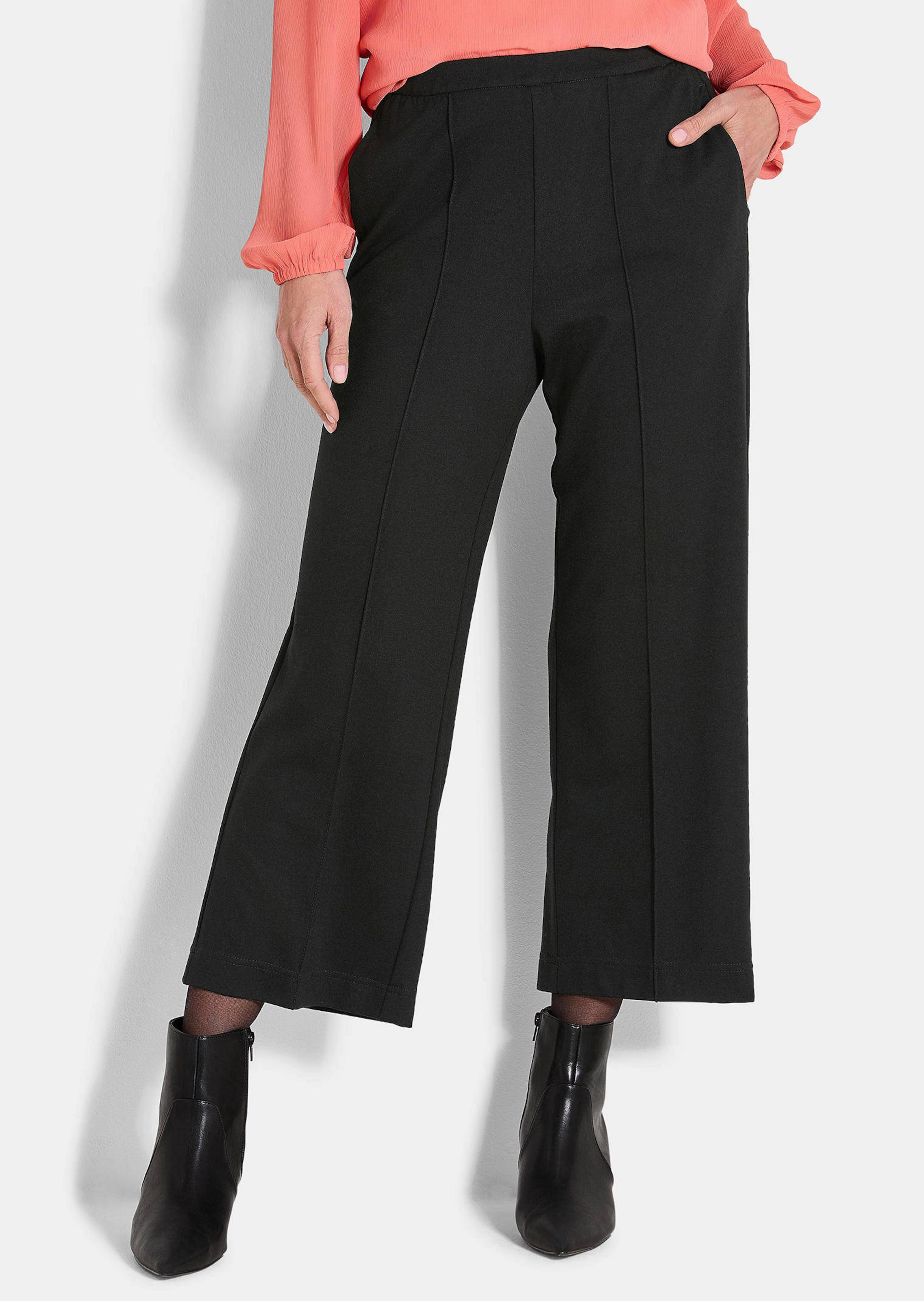 Moderne Hose mit streckenden Biesen