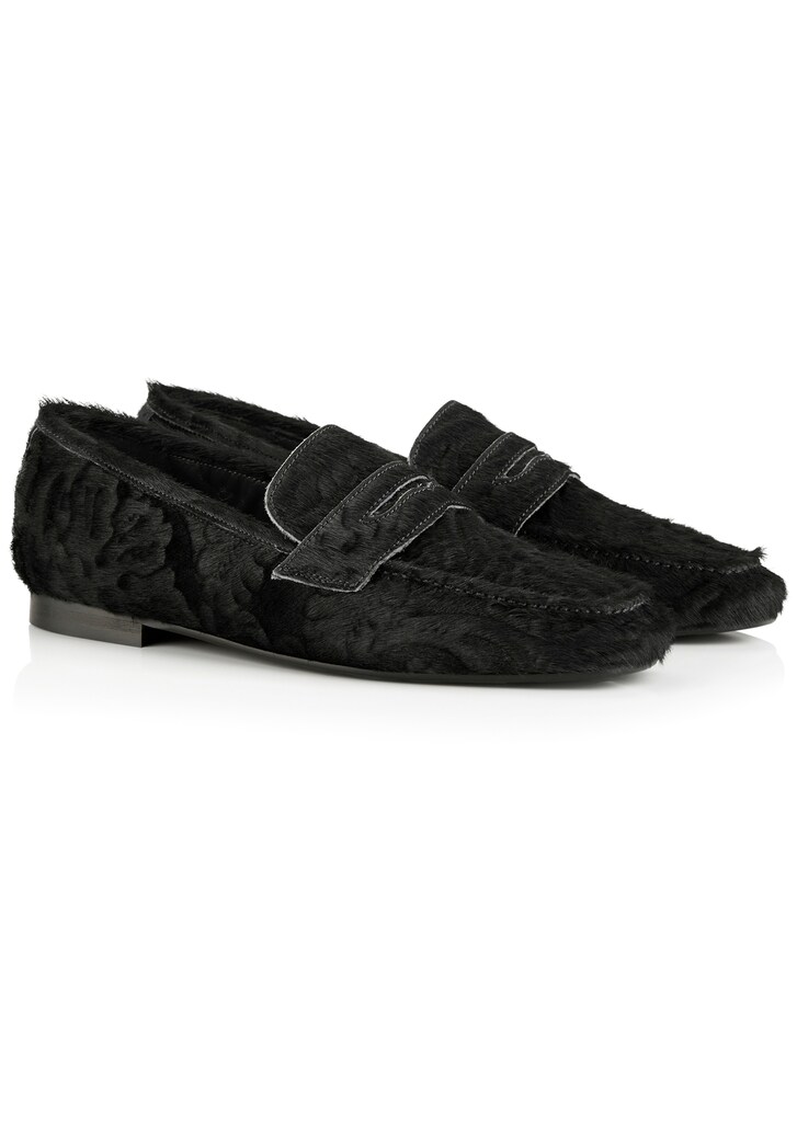 Leather moccasin made from natural fur