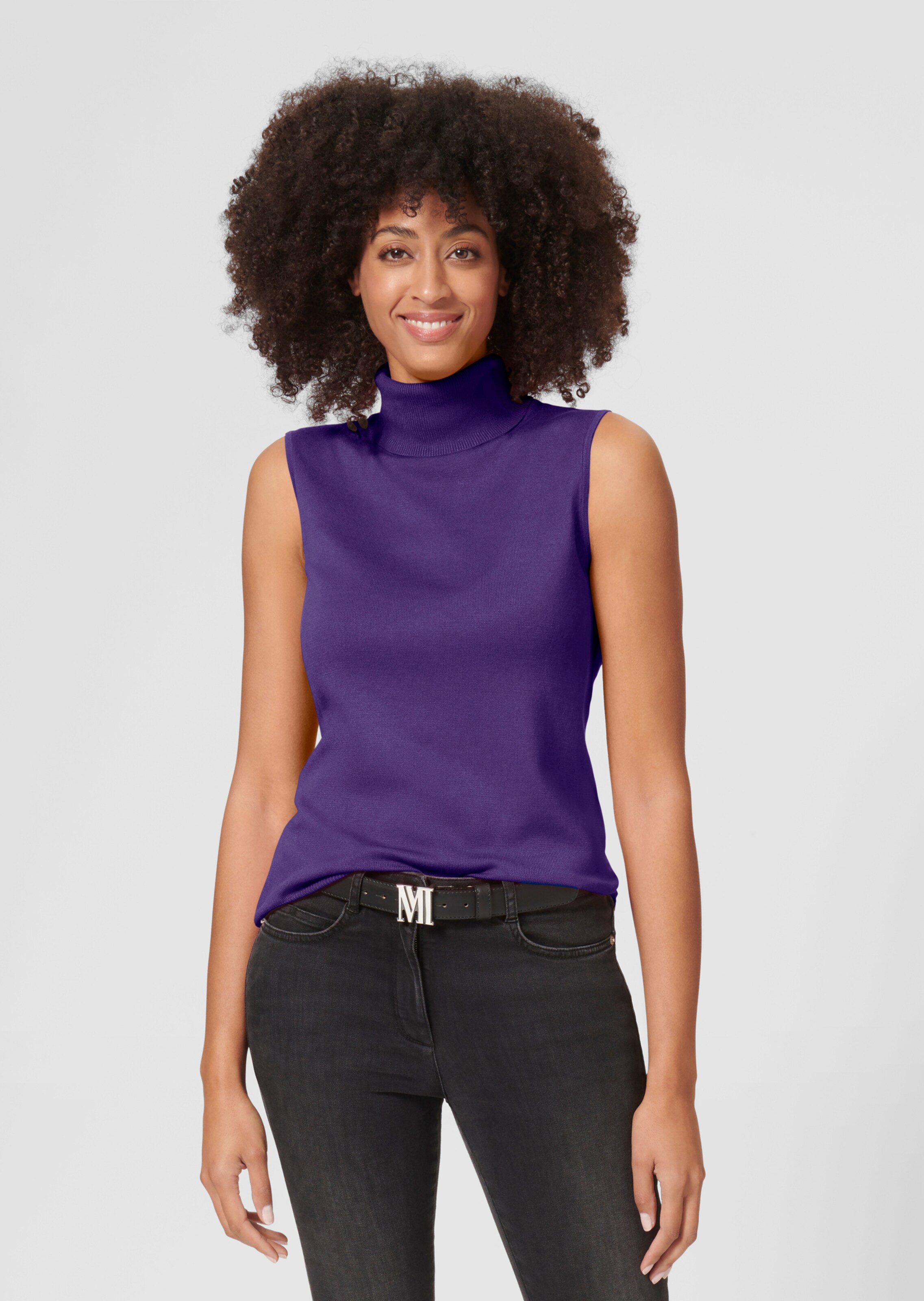 Pull col roulé sans manches