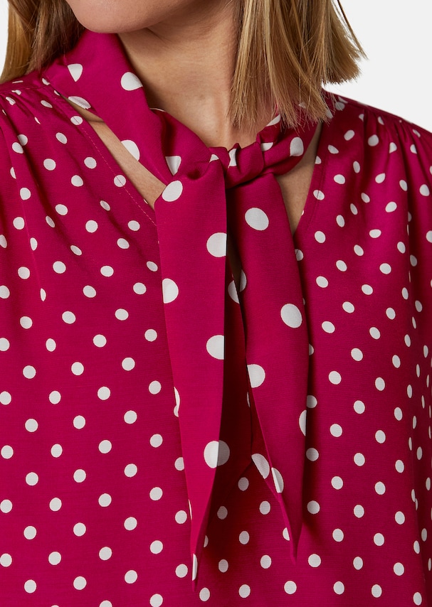 Flared blouse in a fashionable polka dot pattern 4