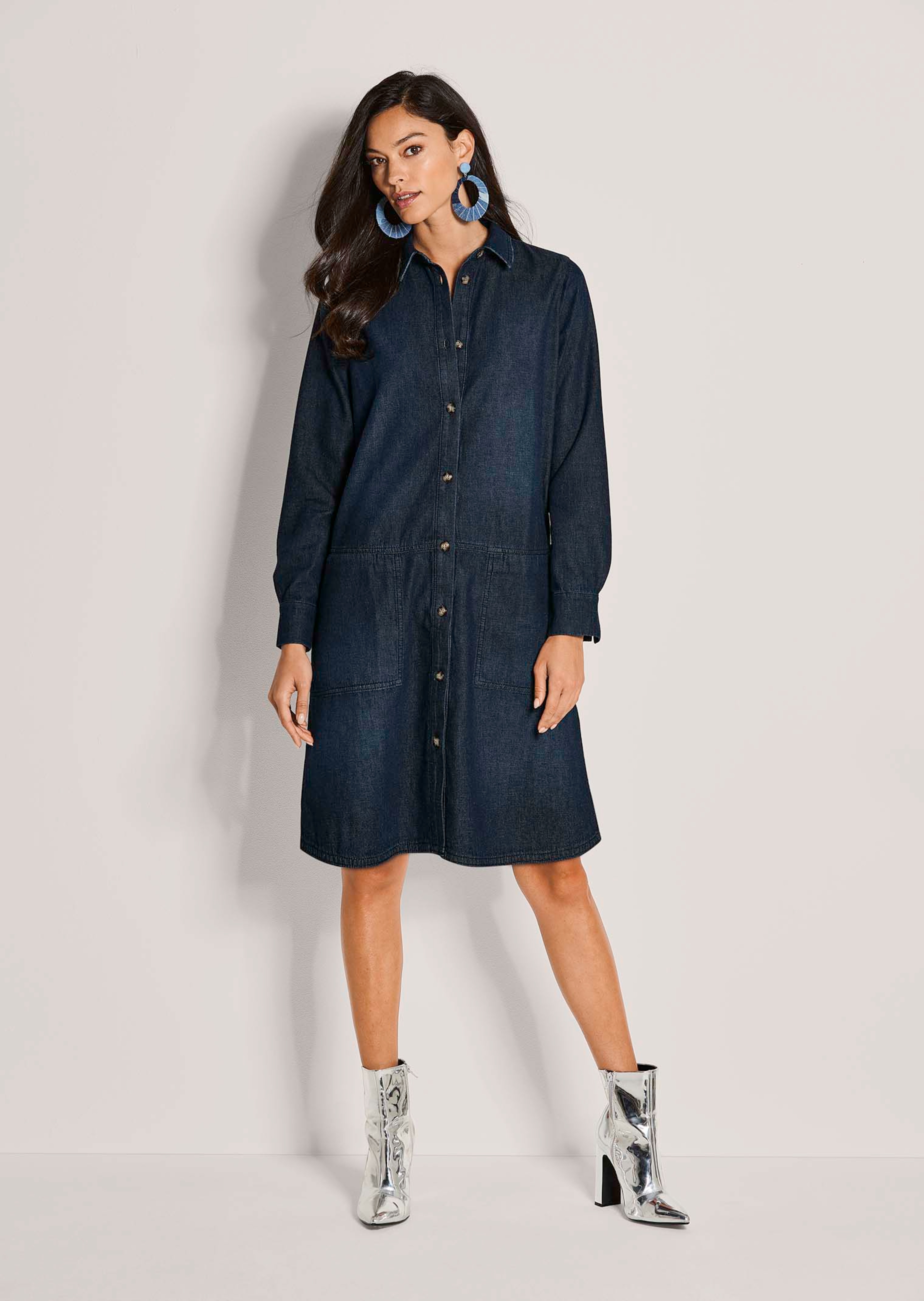 Fashionable denim dress in a shirt blouse style
