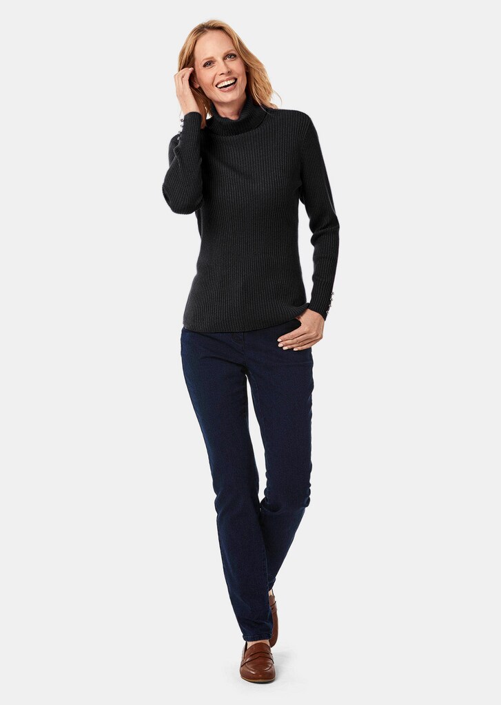 Eleganter Rollkragenpullover mit optischen Knöpfen