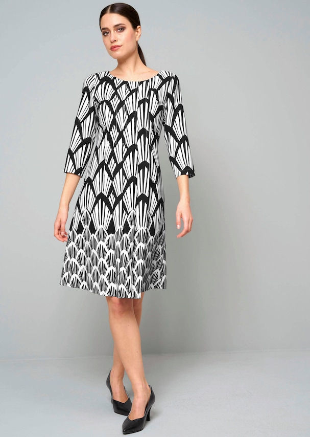 Kleid mit femininen Biesen