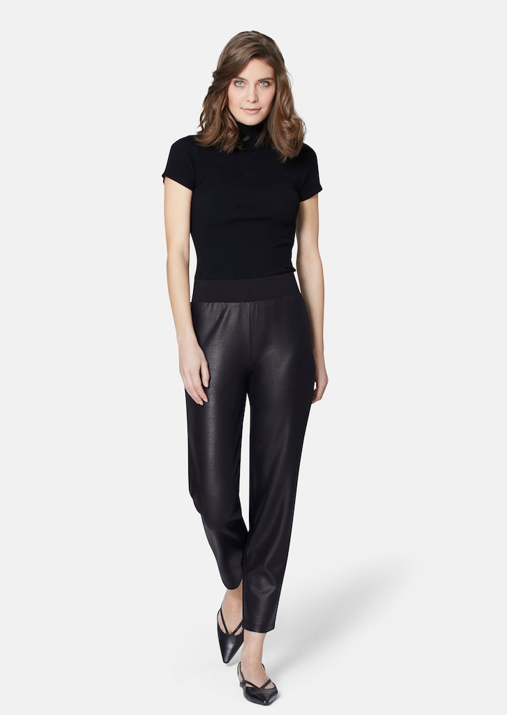 Slim-fit trousers in a leather look 1