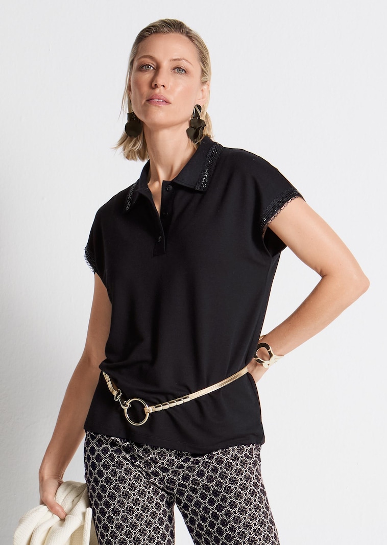 Poloshirt met kanten randjes