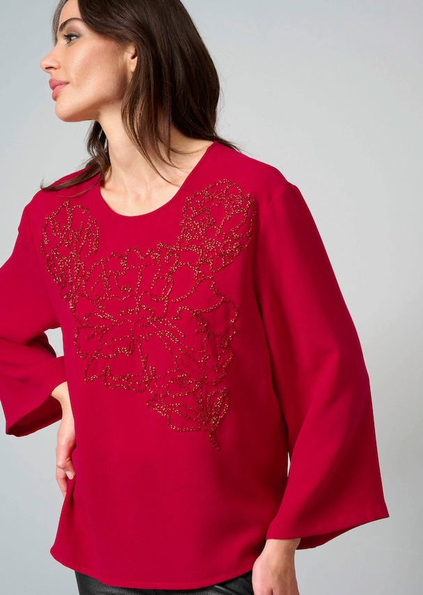 Bluse mit Perlenmotiv 4