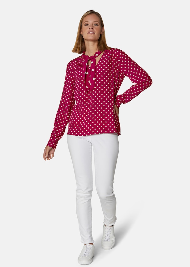 Flared blouse in a fashionable polka dot pattern 1