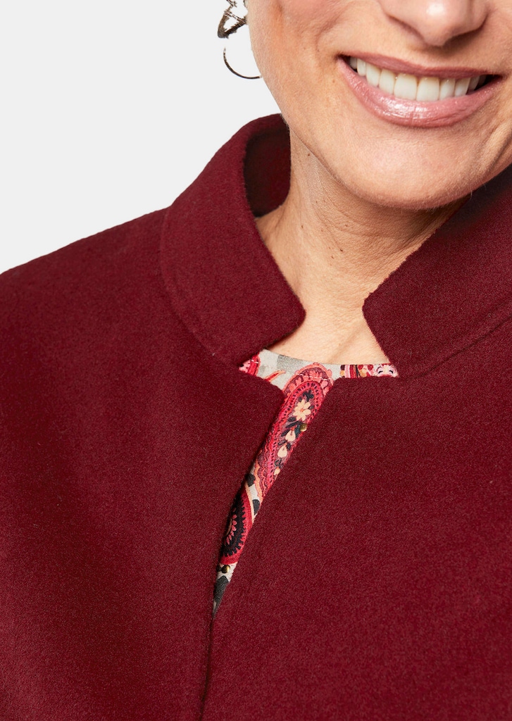 Manteau court composé de laine 4