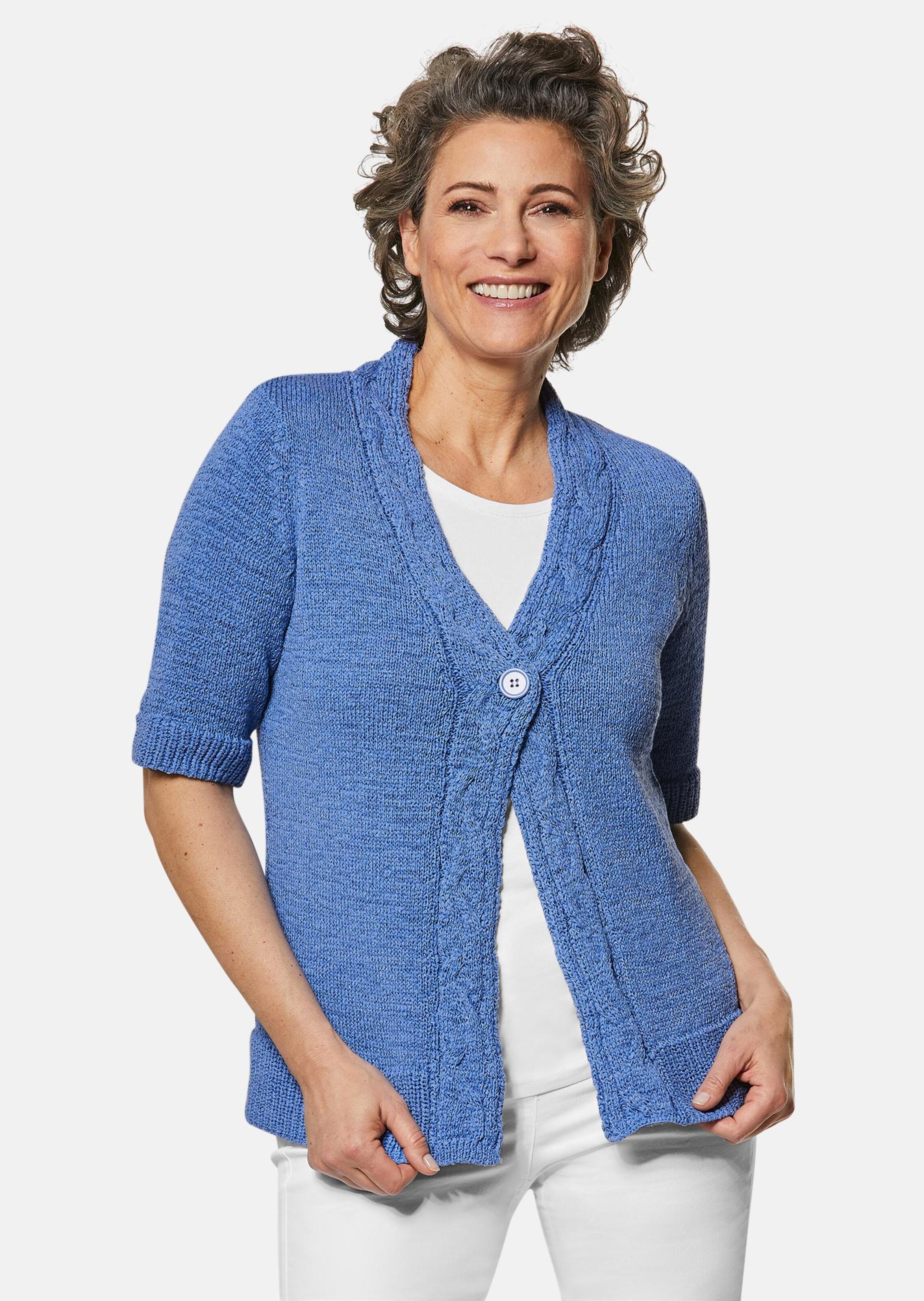 Tricot jasje van lintjesgaren, met mooie details