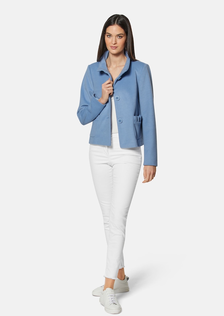 Short blazer with minimal structure and ruffle detail 1