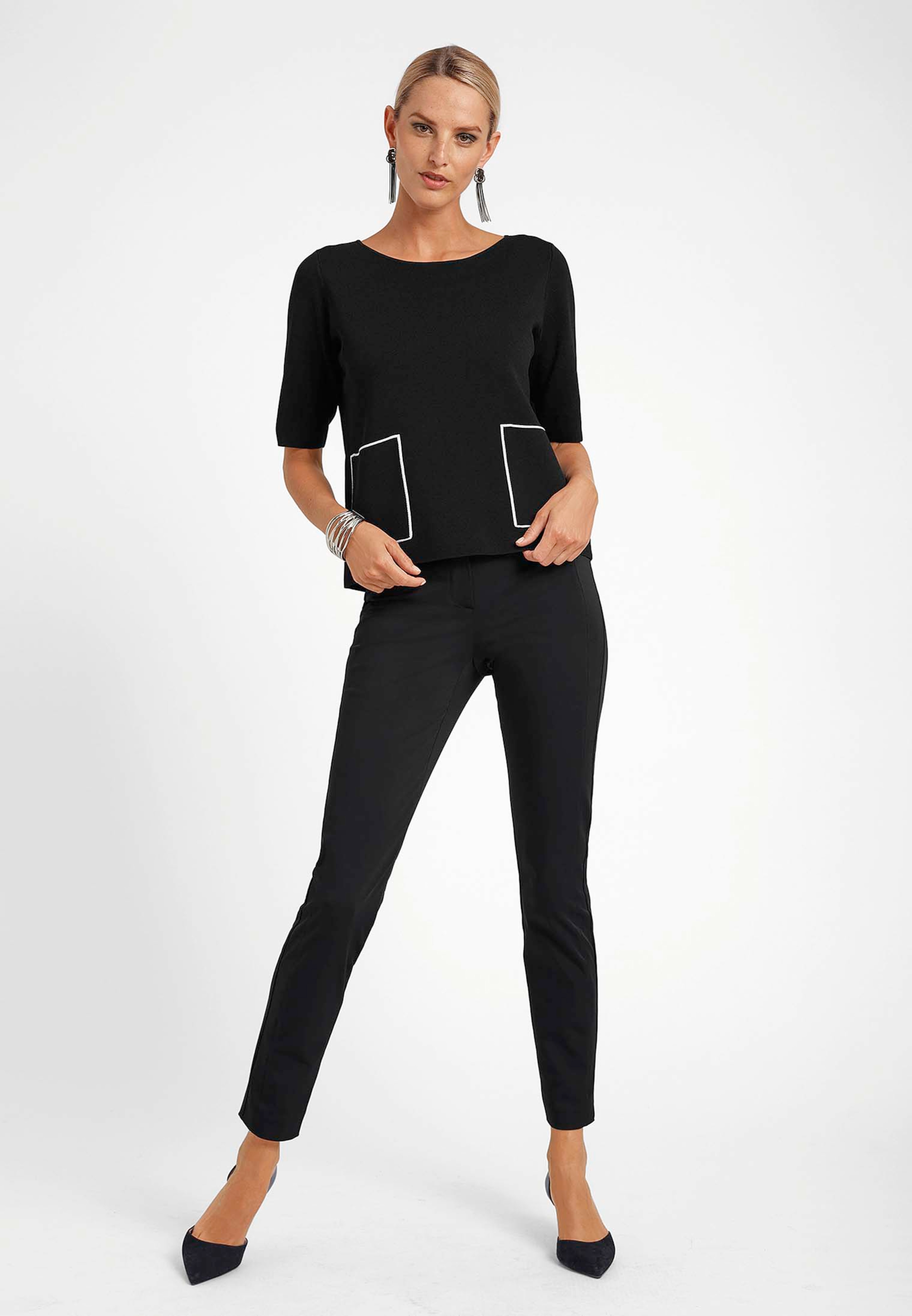 Pull manches courtes avec poches plaquées