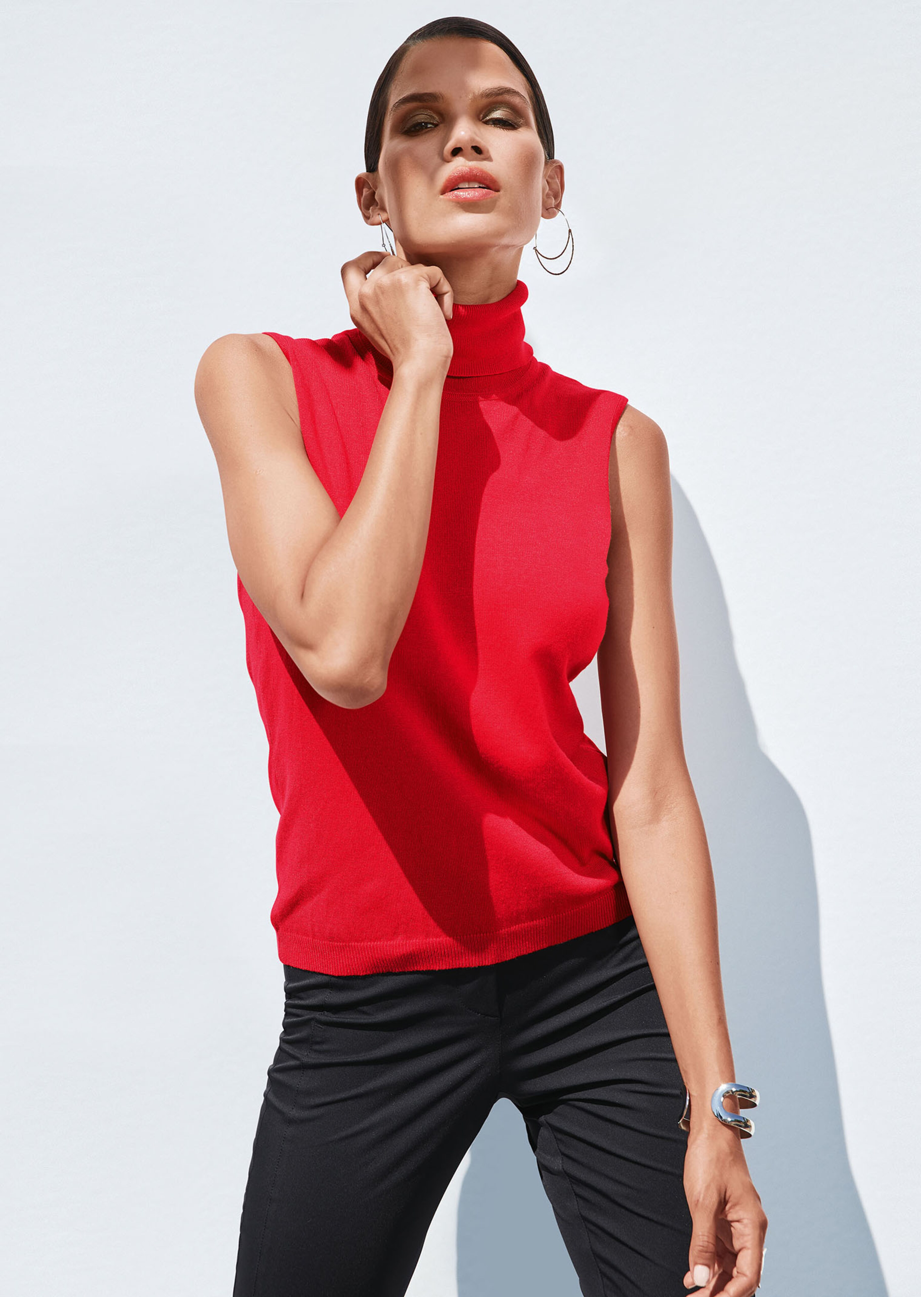 Pull col roulé sans manches
