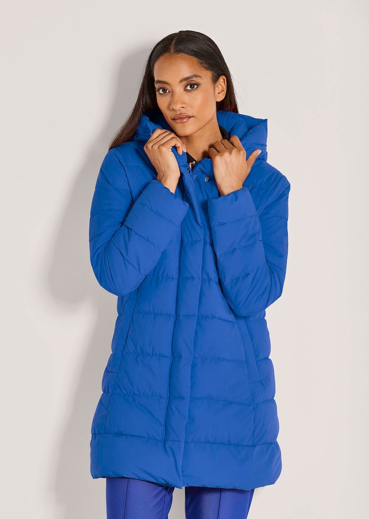 Lange Steppjacke mit Kapuze