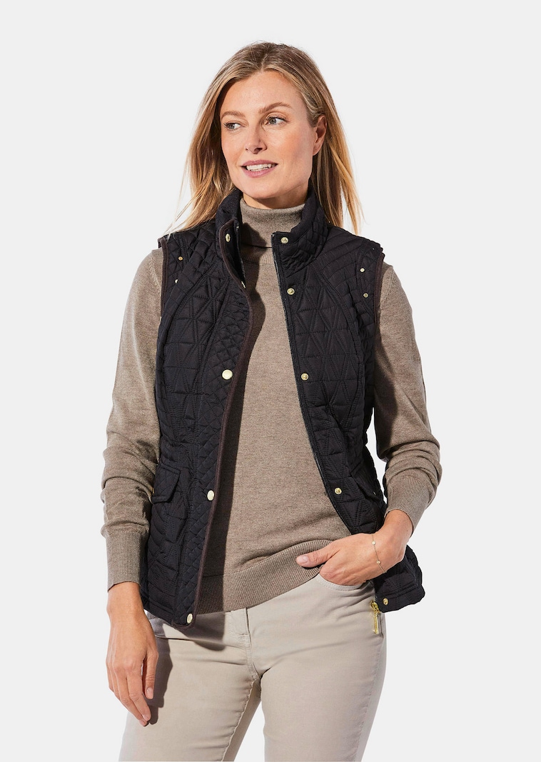 Gilet matelassé avec surpiqûres à effet visuel amincissant