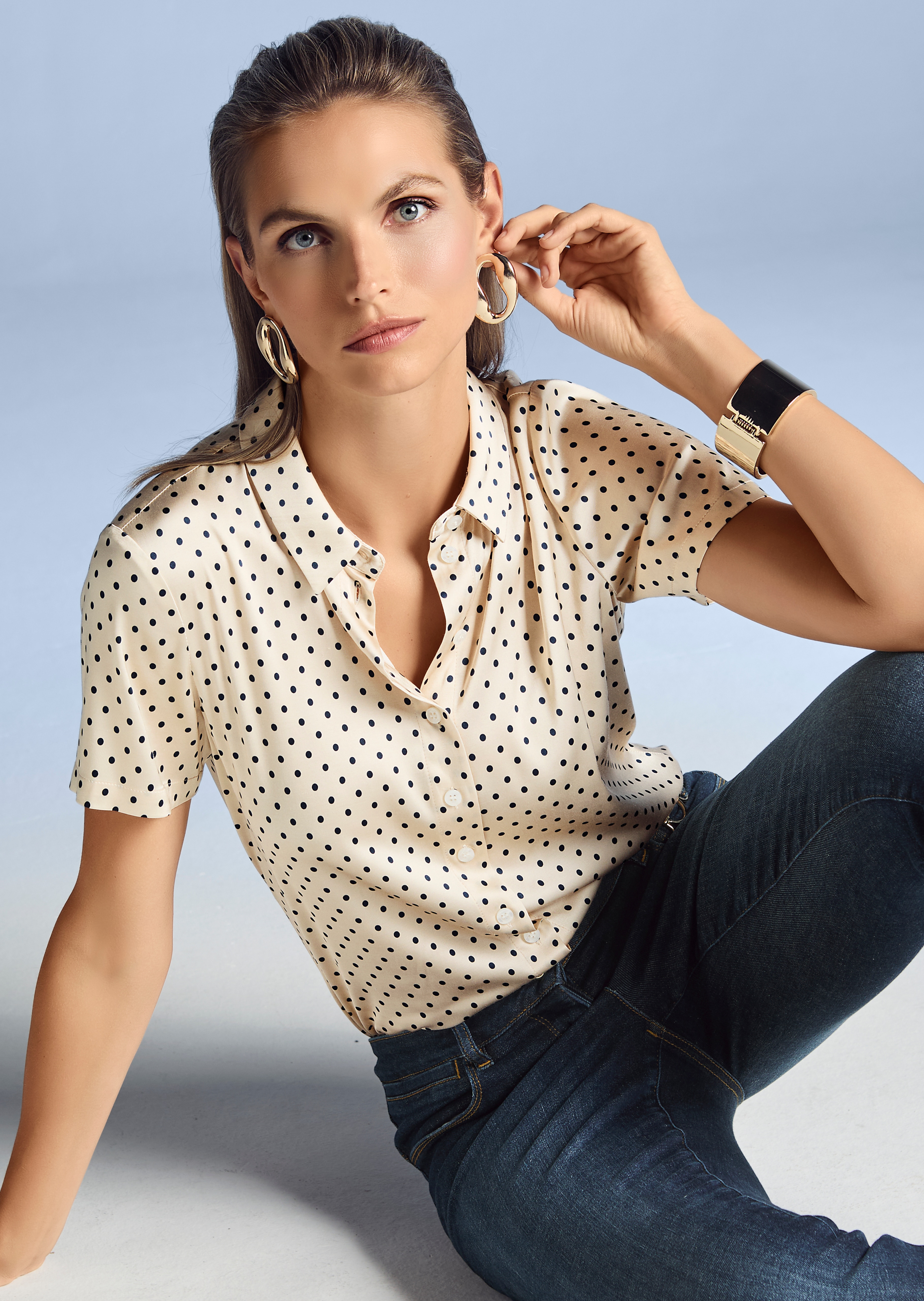 Short-sleeved blouse in a polka dot design
