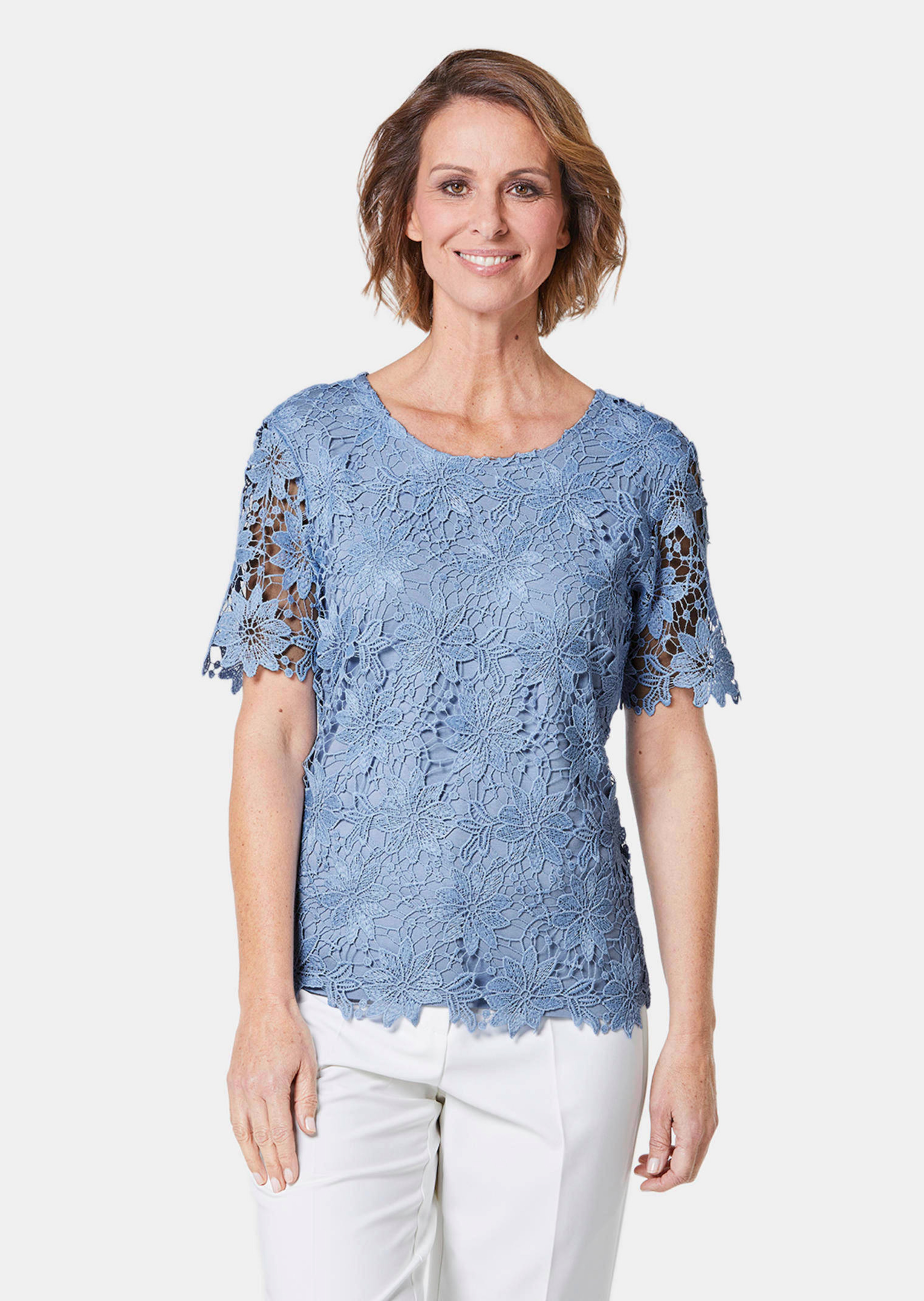 Feestelijke blouse van chic kant