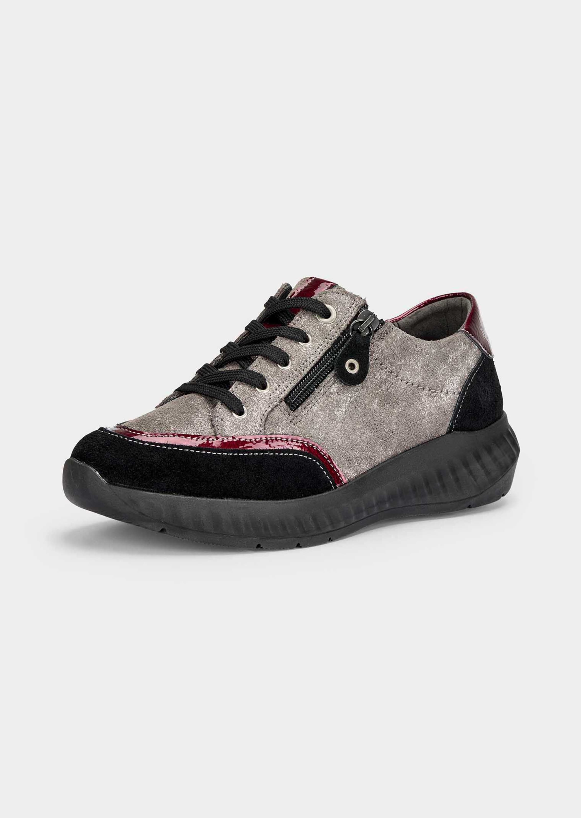 Sneakers met modieuze lakaccenten