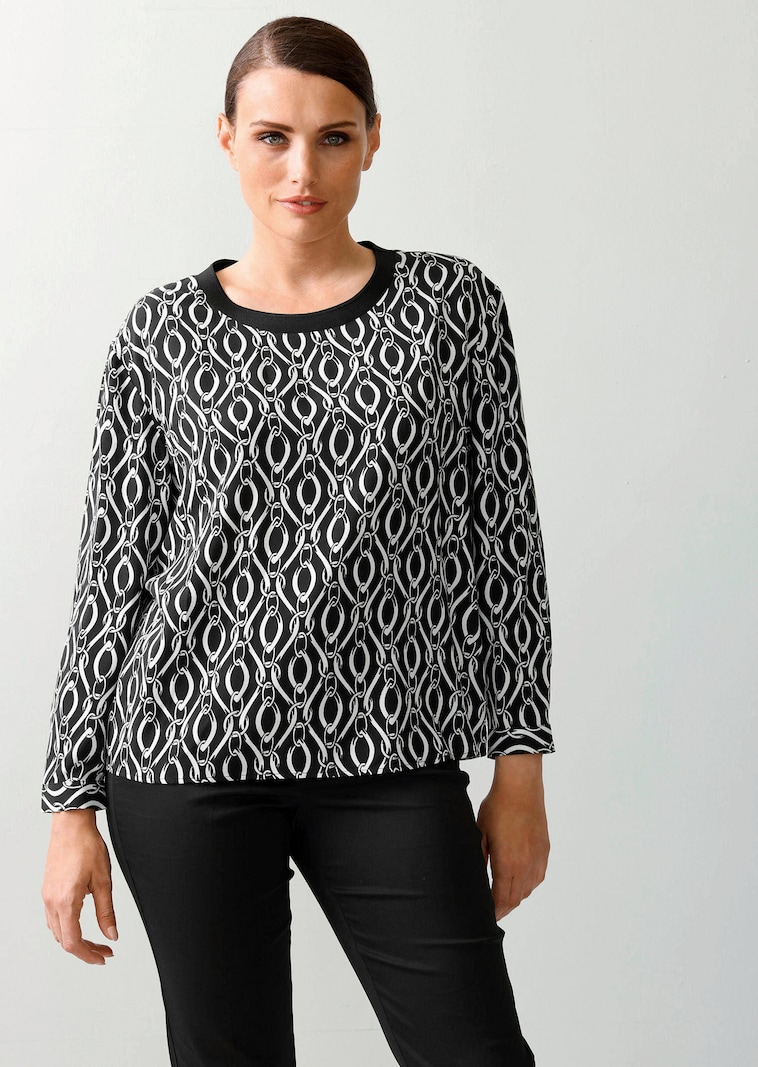 Bluse in grafischem Kettendessin