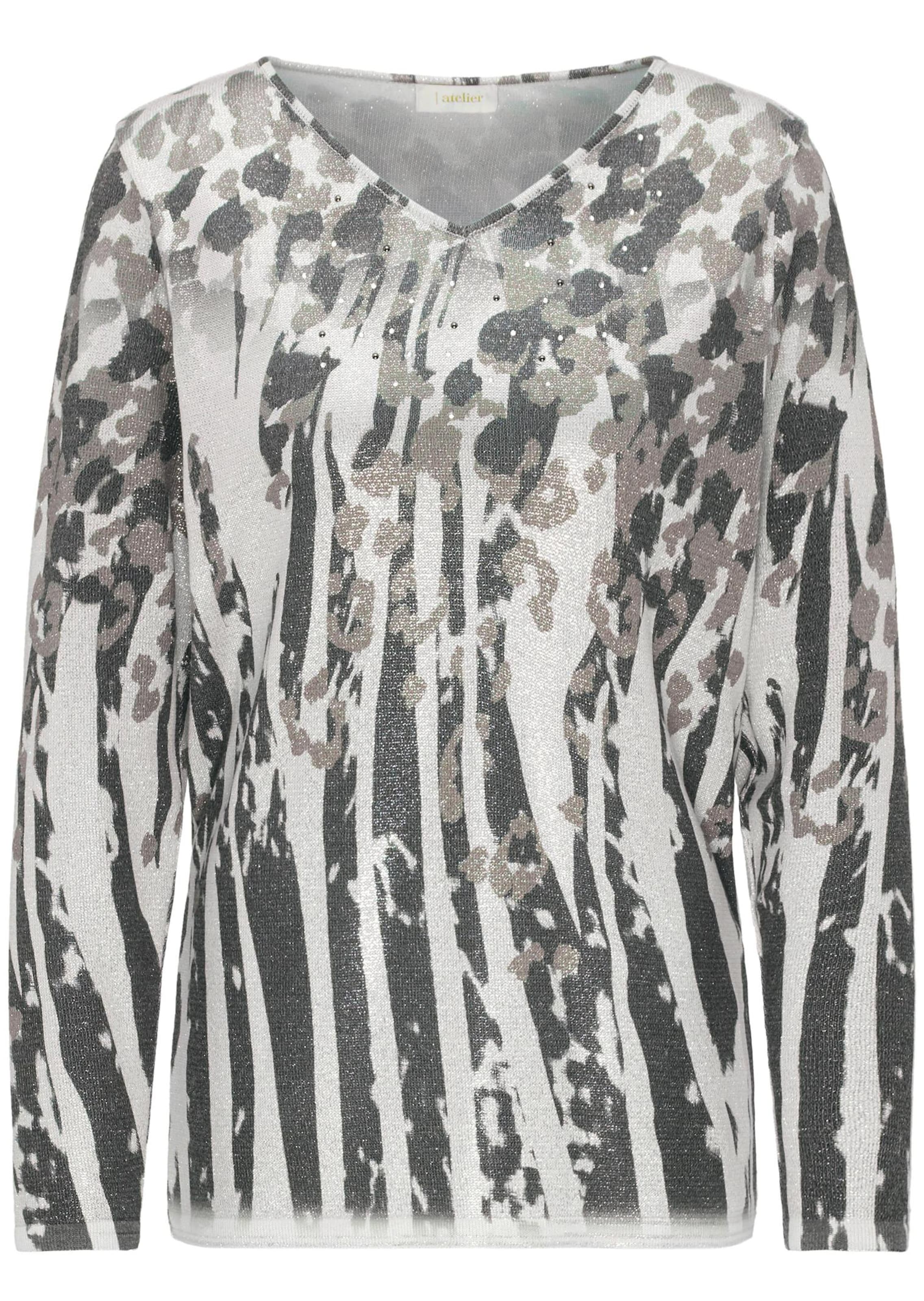 Gemusterter Pullover in Glanzoptik