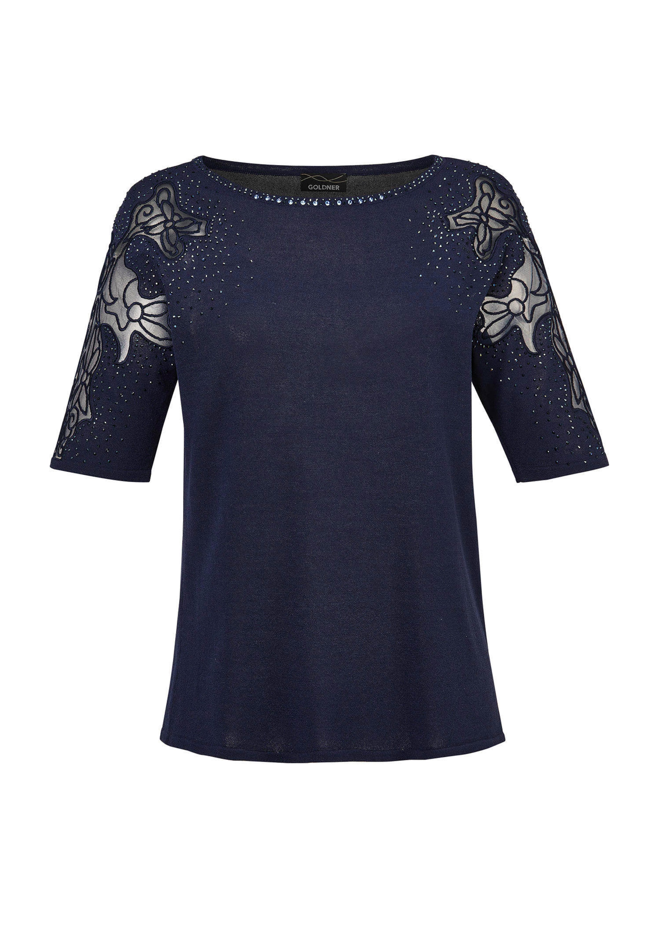 Pull avec empiècements en dentelle et pierres scintillantes