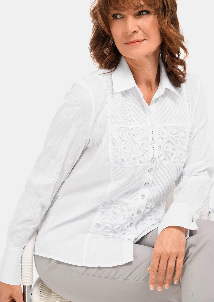 Besonders elegante Crashbluse mit detailreicher Verarbeitung
