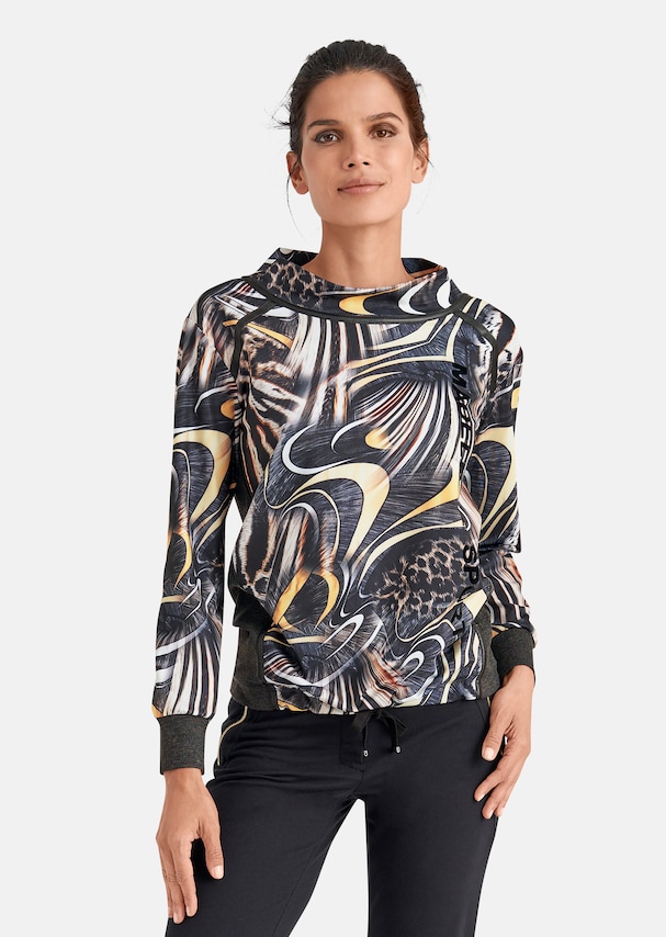 Sweatshirt with abstract animal print and leather accents
