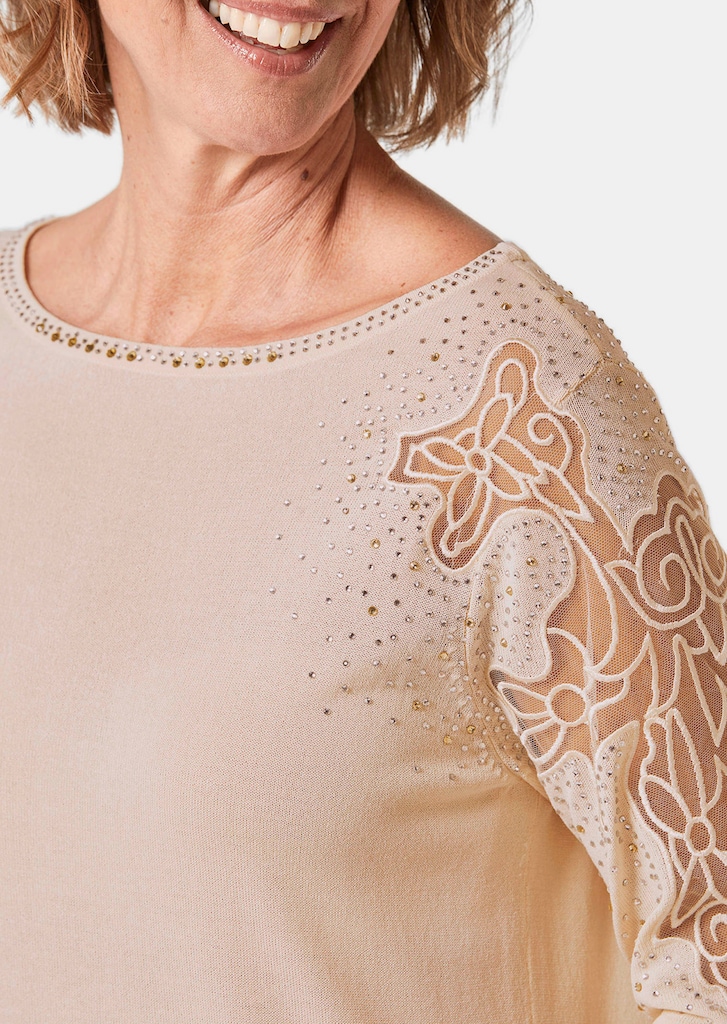 Pullover mit Spitzeneinsätzen und Glanzsteinchen