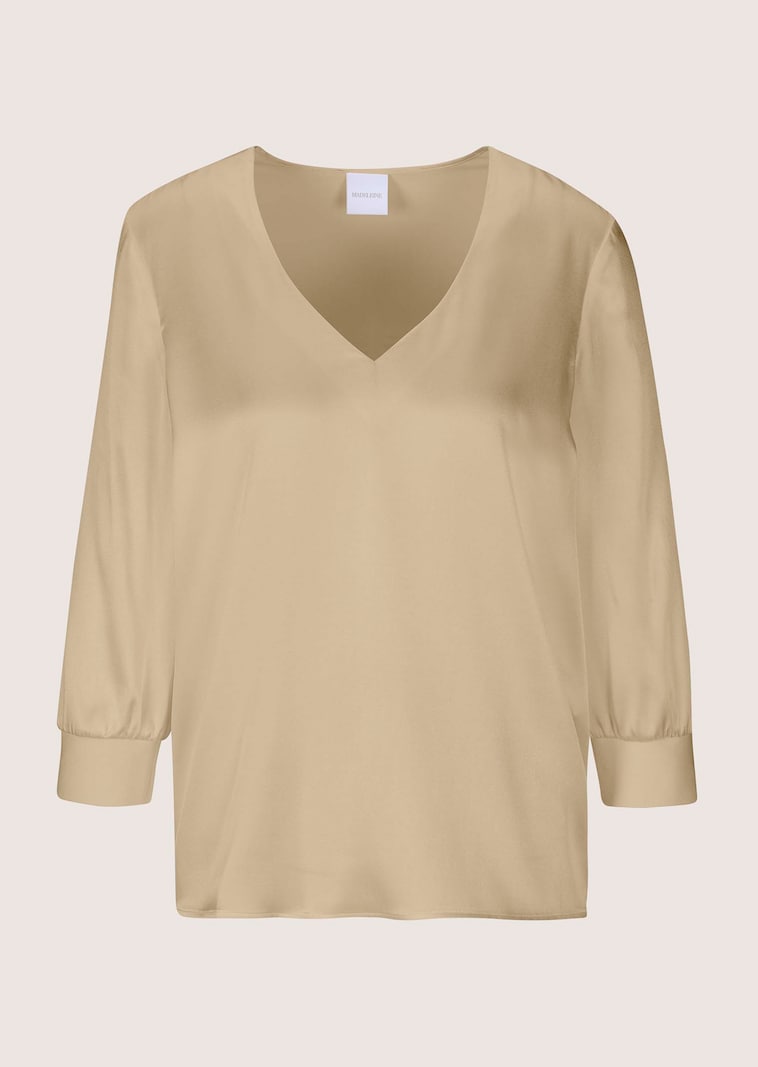 Blouse en soie stretch avec encolure en V