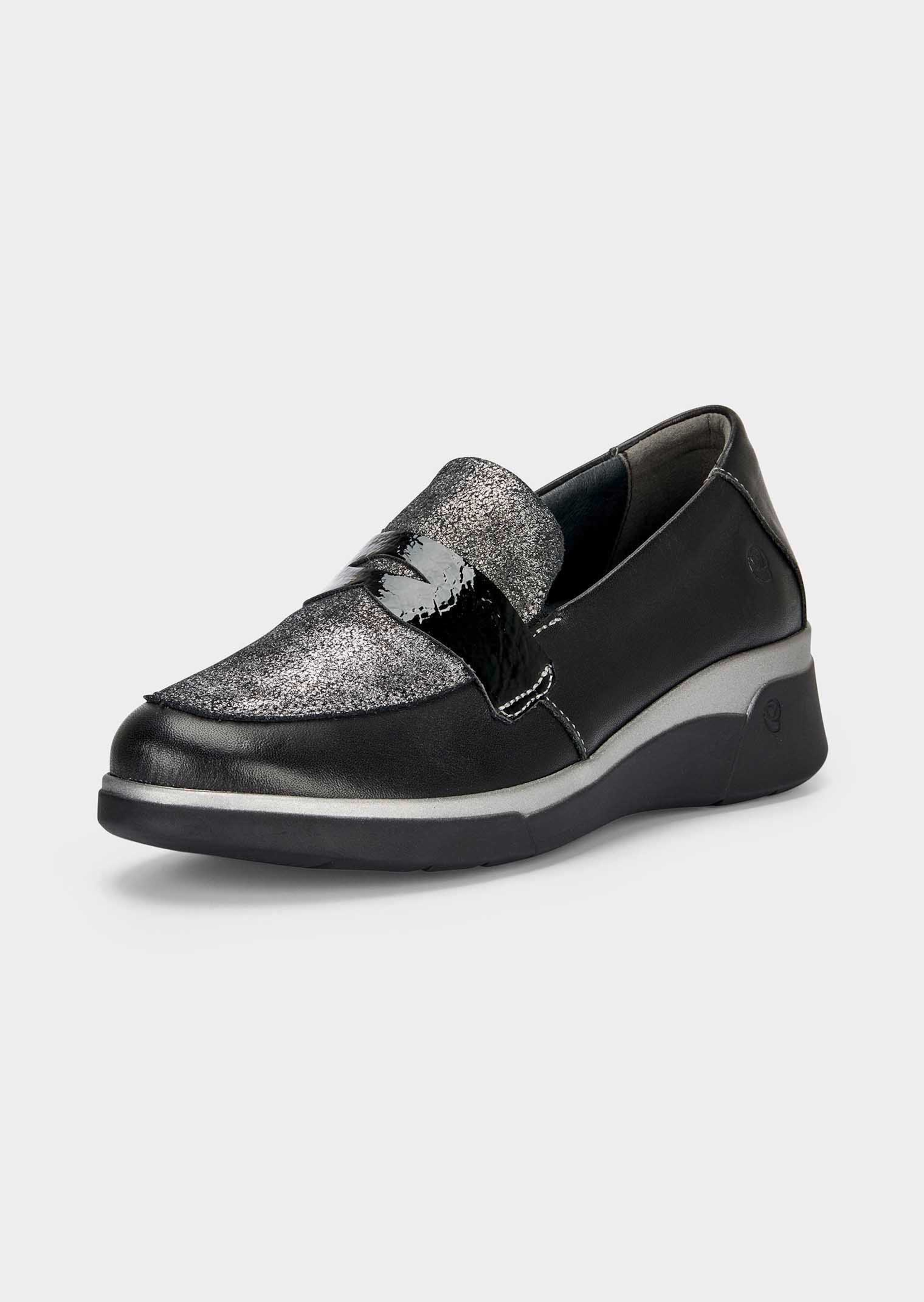 Glinsterende schoenen met lakaccenten