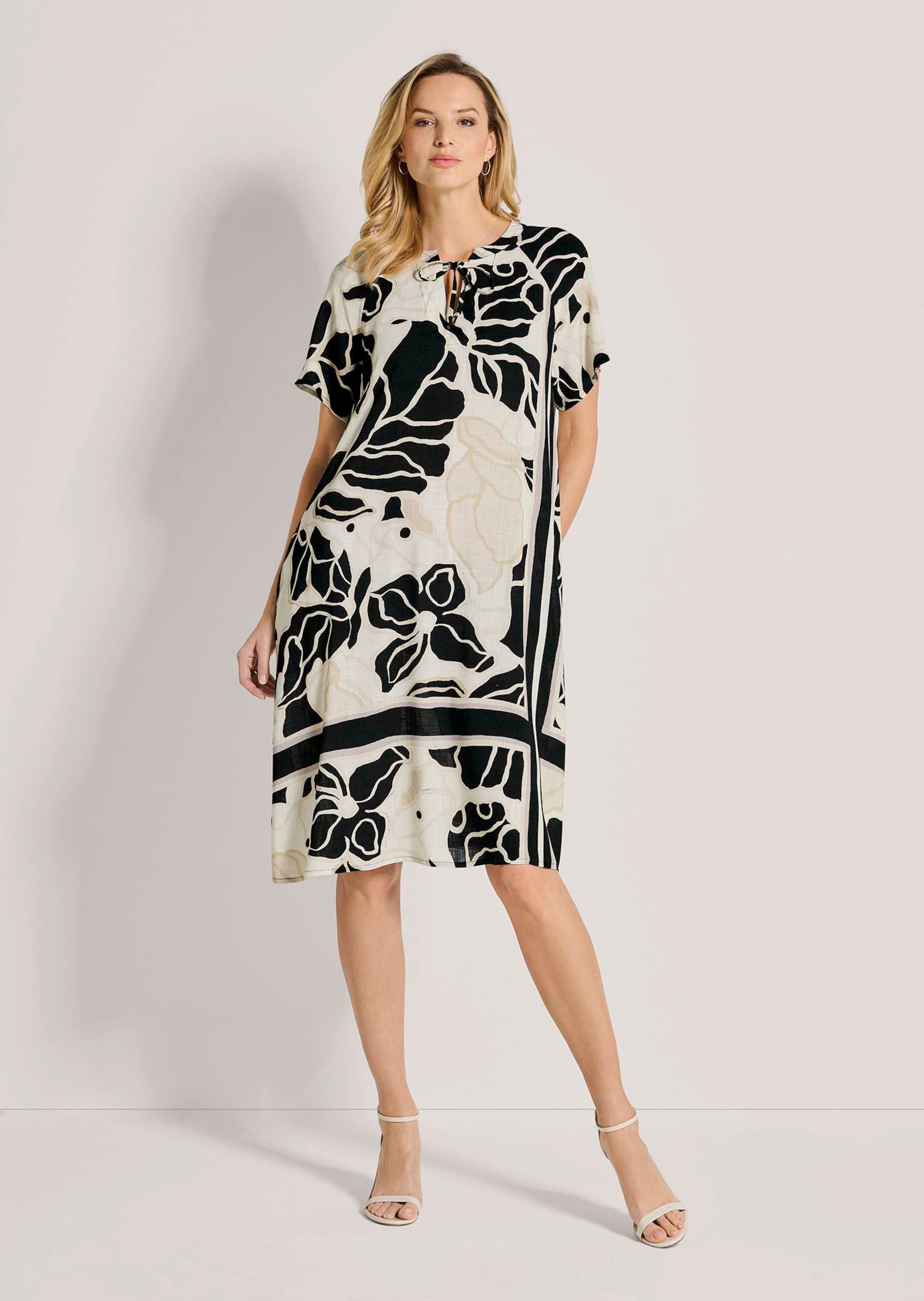 Printed summer dress in natural white / black / beige | MADELEINE Fashion
