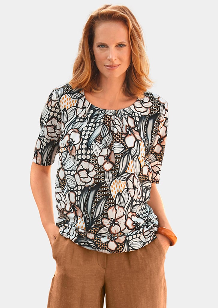Vrouwelijke gedessineerde blouse met ronde hals