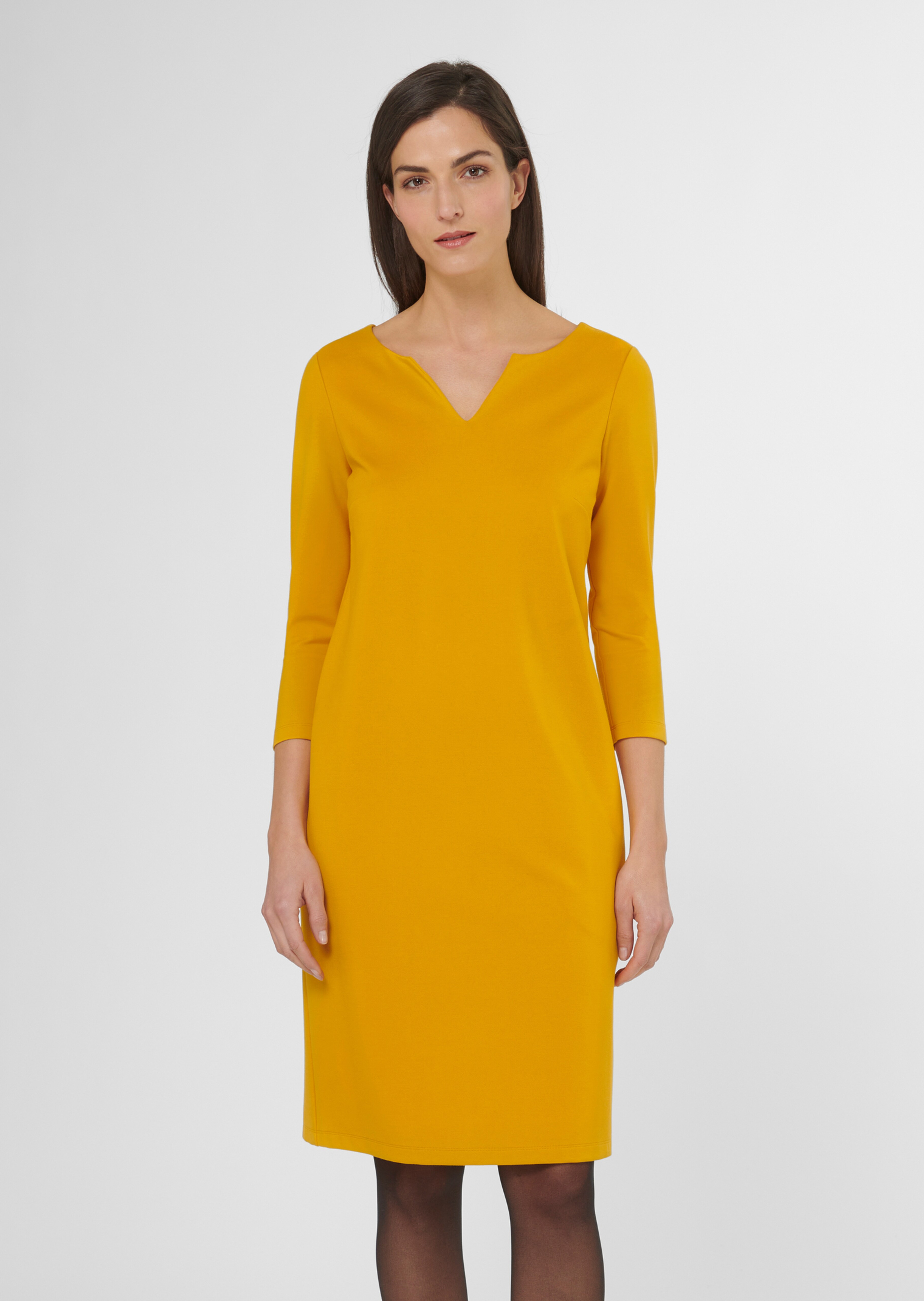 Stretch dress with short sleeves and flared skirt