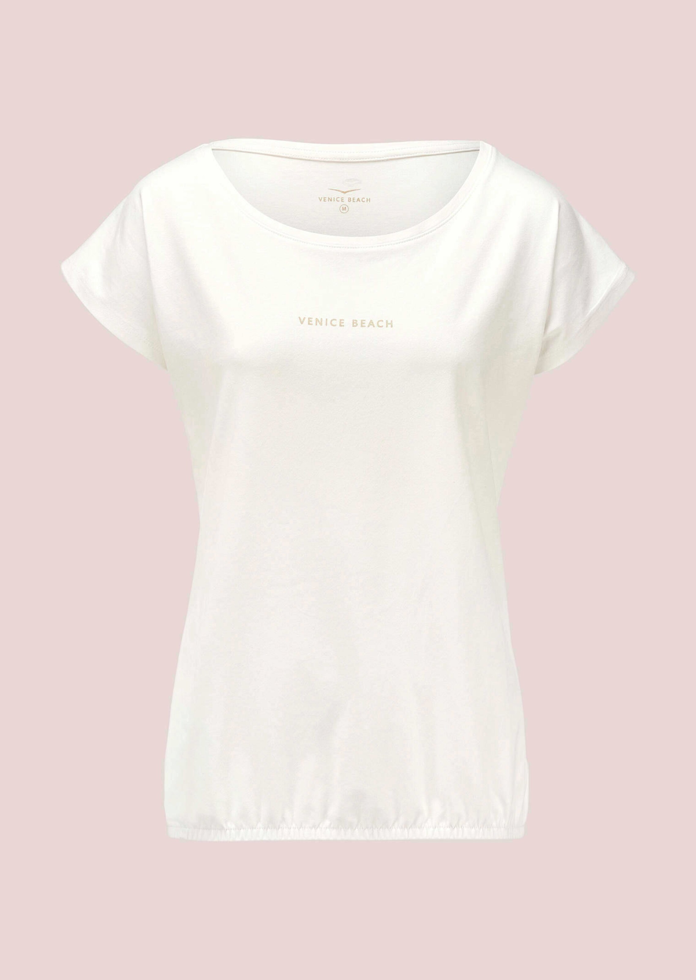 Paita joustavalla helmalla