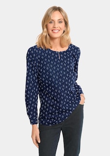 Painokuvioitu pusero laskeutuvaa materiaalia thumbnail 1