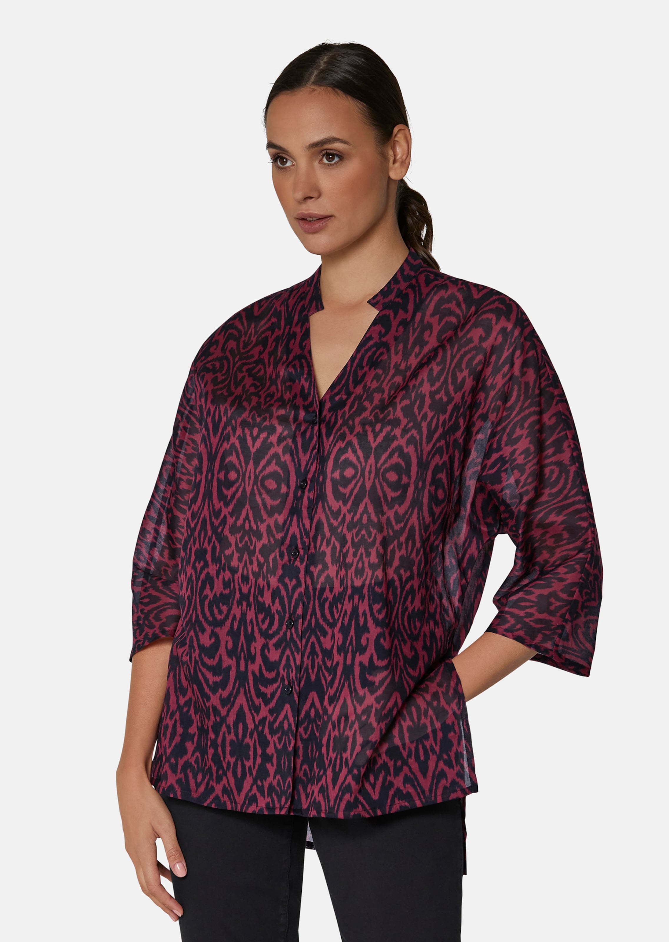 Bluse mit kontraststarkem Print und Fledermausärmeln