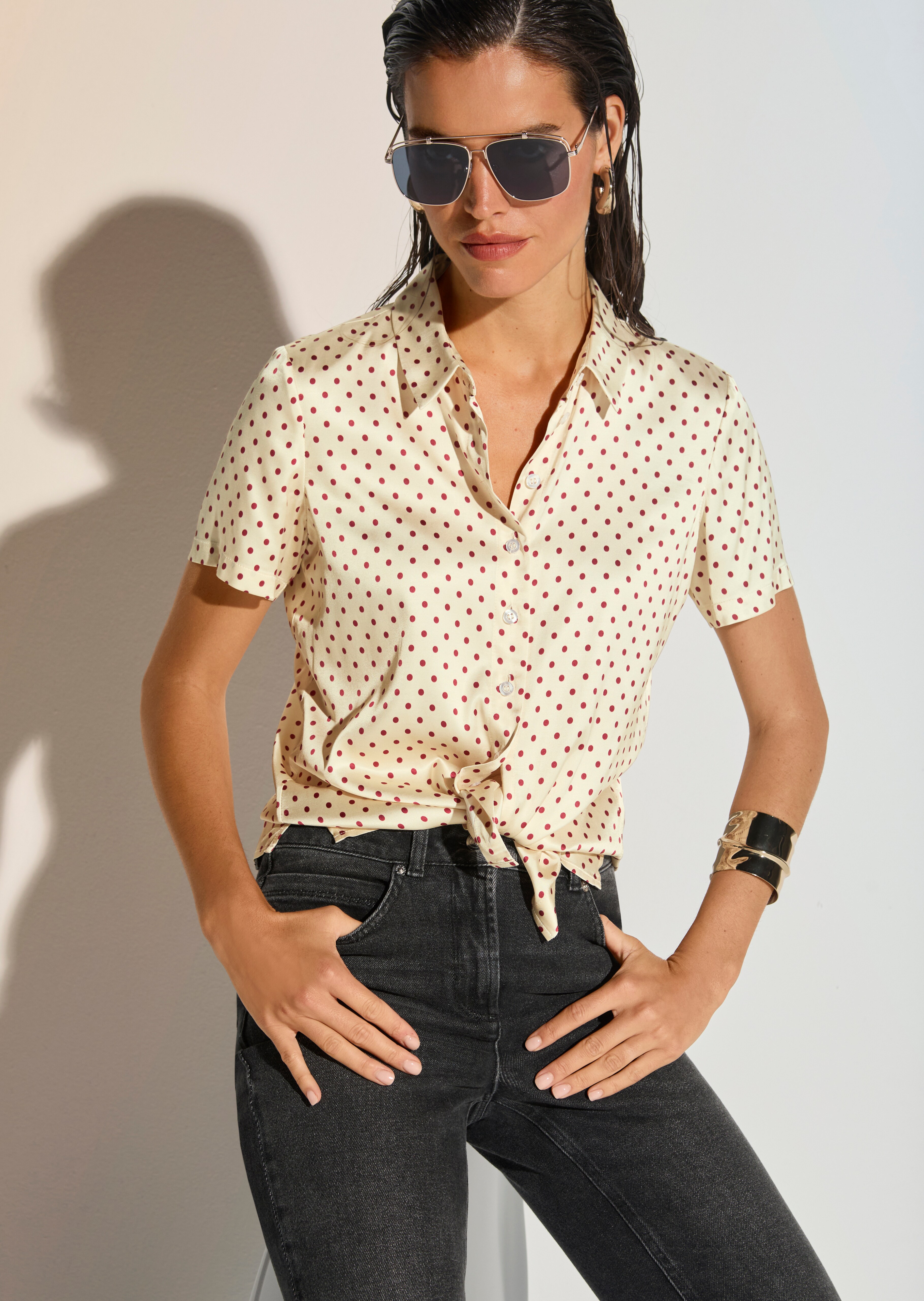 Short-sleeved blouse in a polka dot design