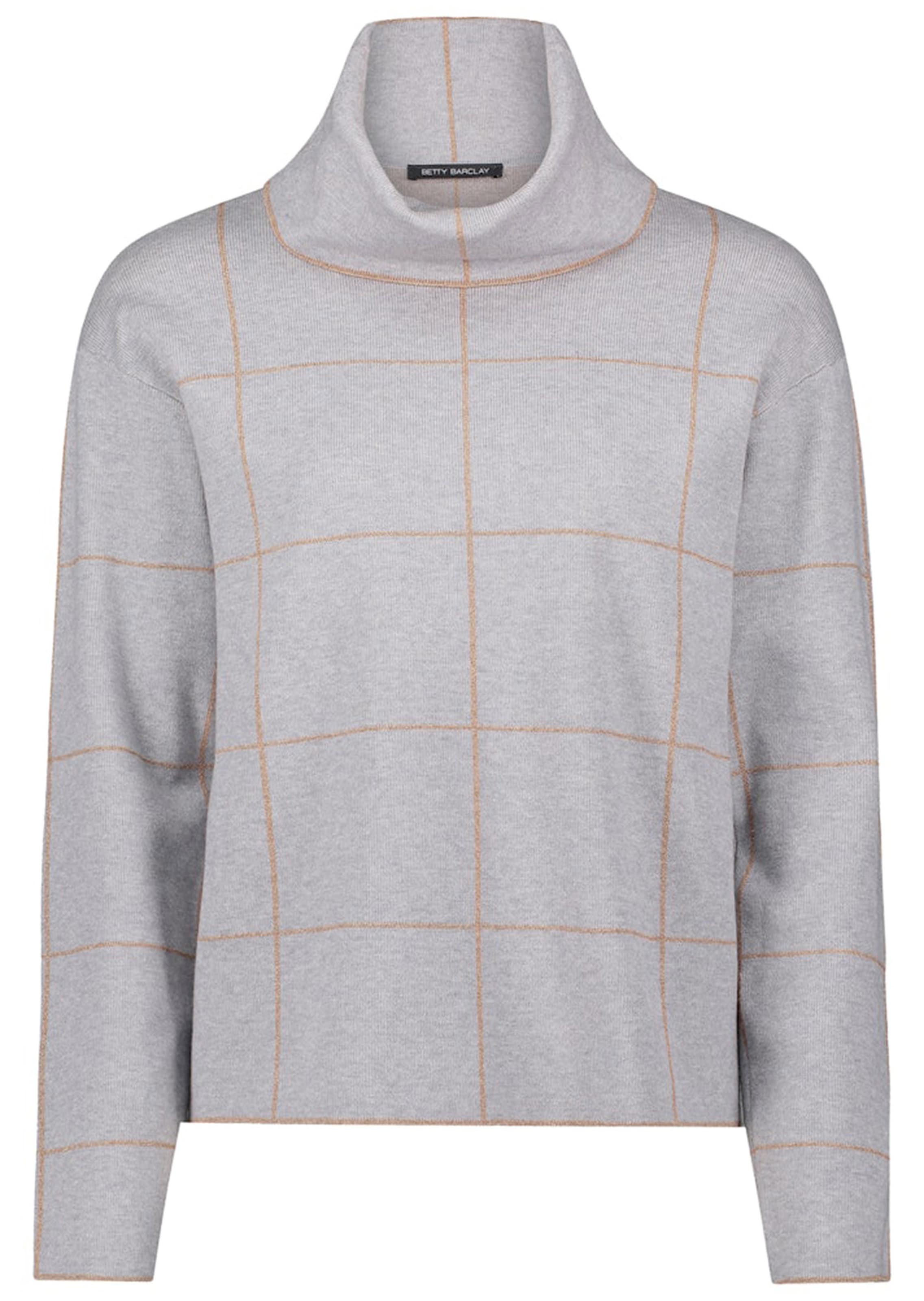 Pull à col roulé avec motif à carreaux