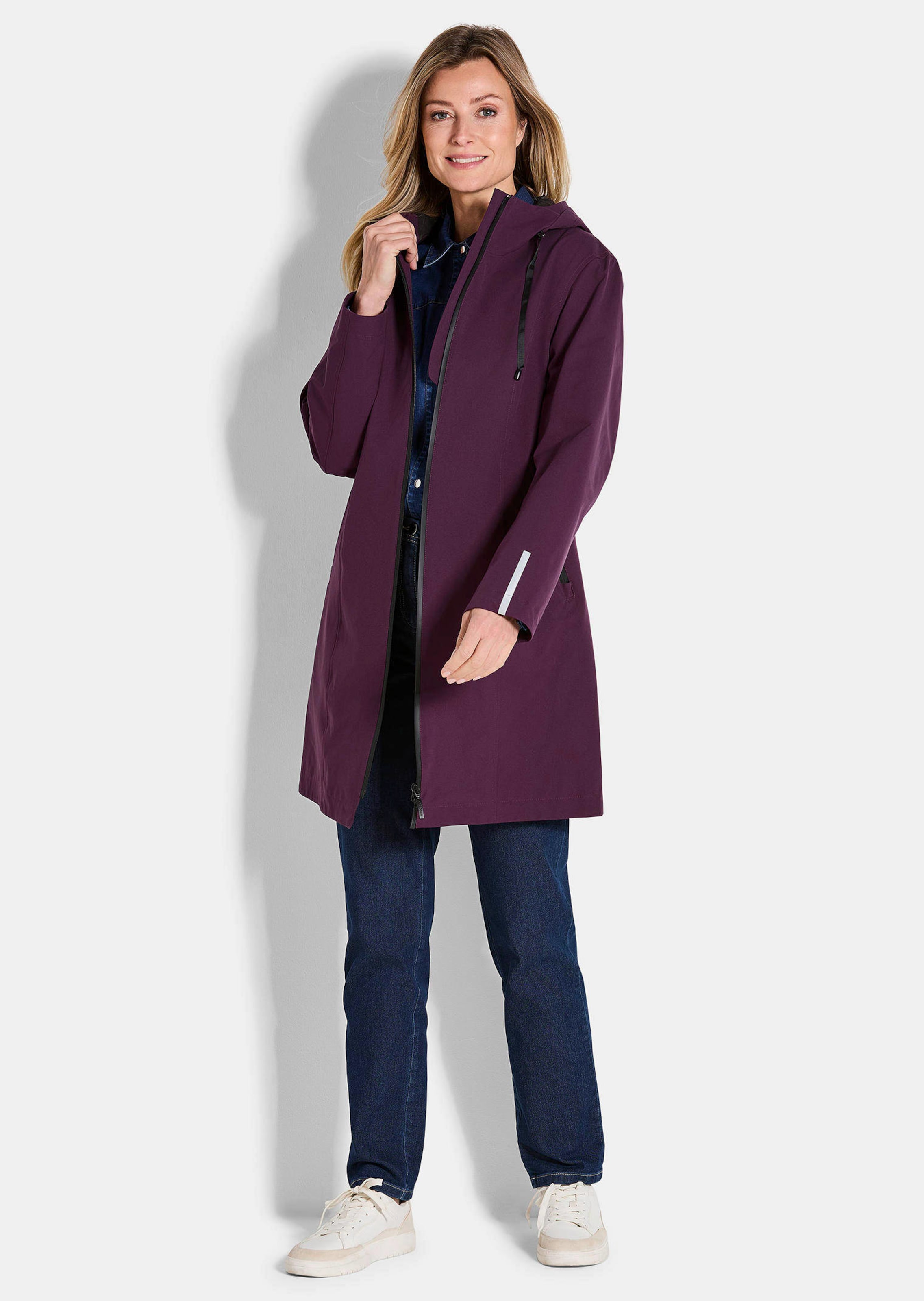 Veste imperméable avec éléments réfléchisseurs