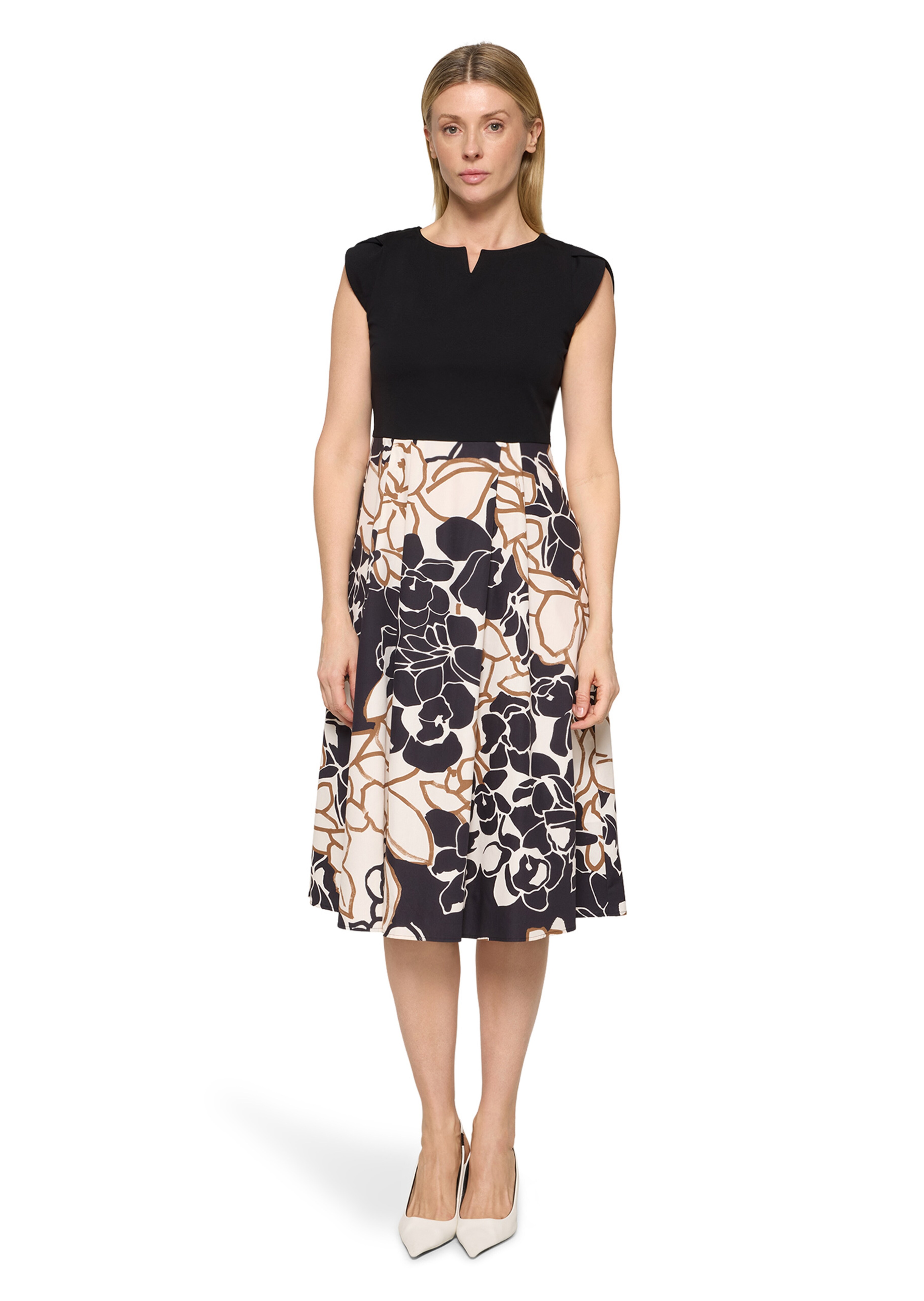 Jurk: jersey shirt en geweven rok