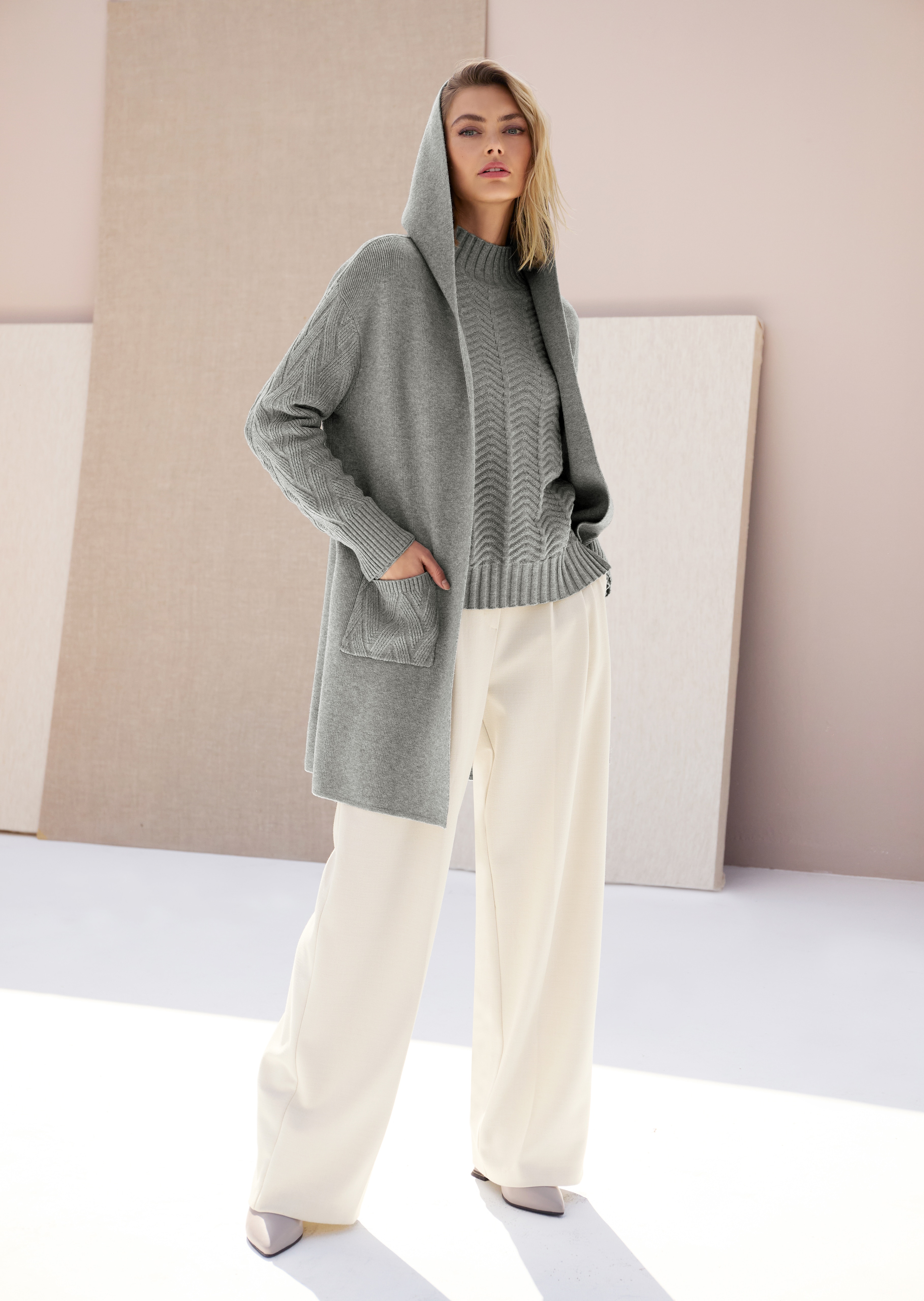 Long knitted cardigan with hood