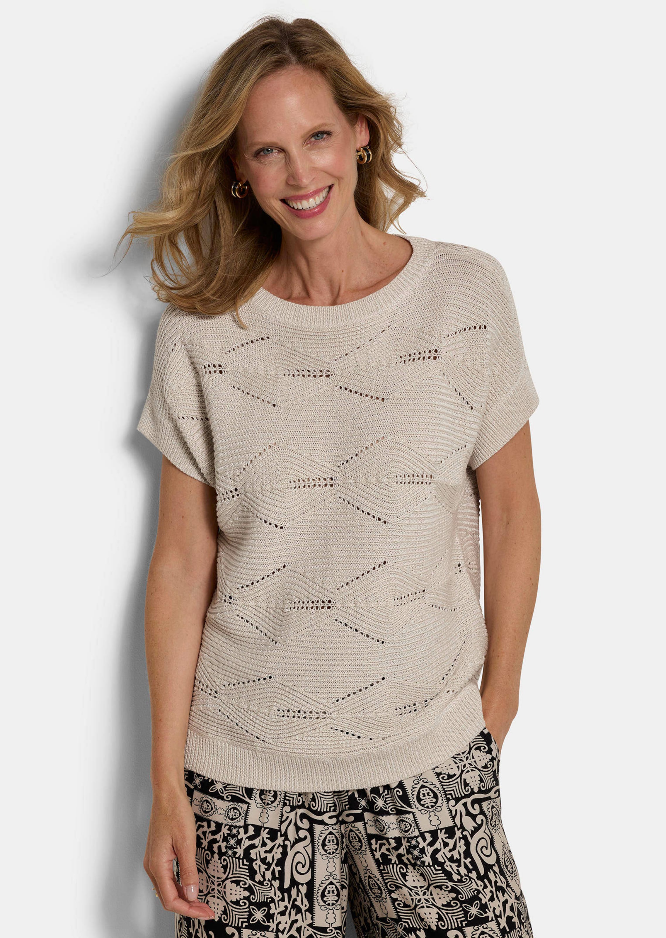 Pull ajouré, légèrement brillant