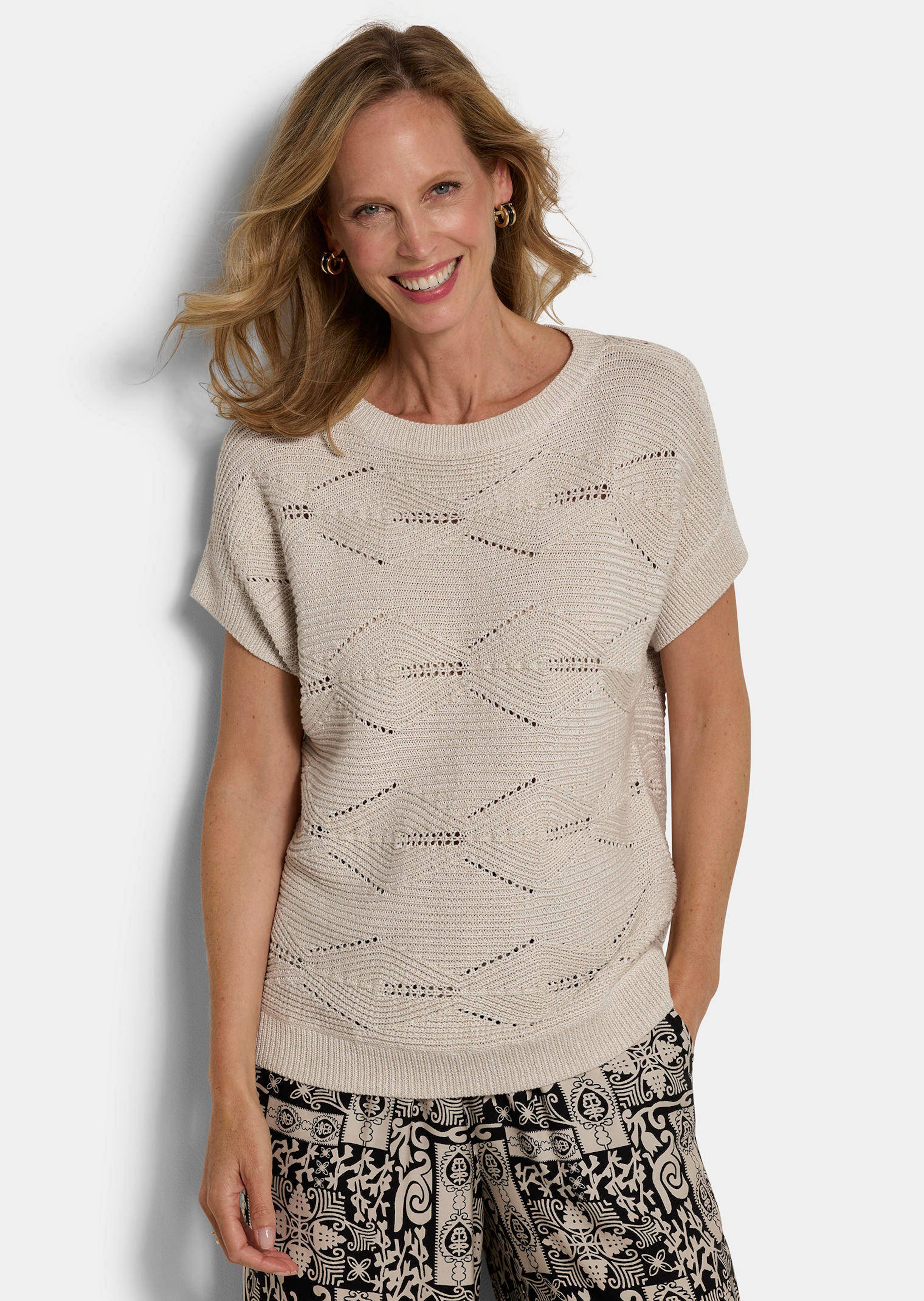 Pull ajouré, légèrement brillant