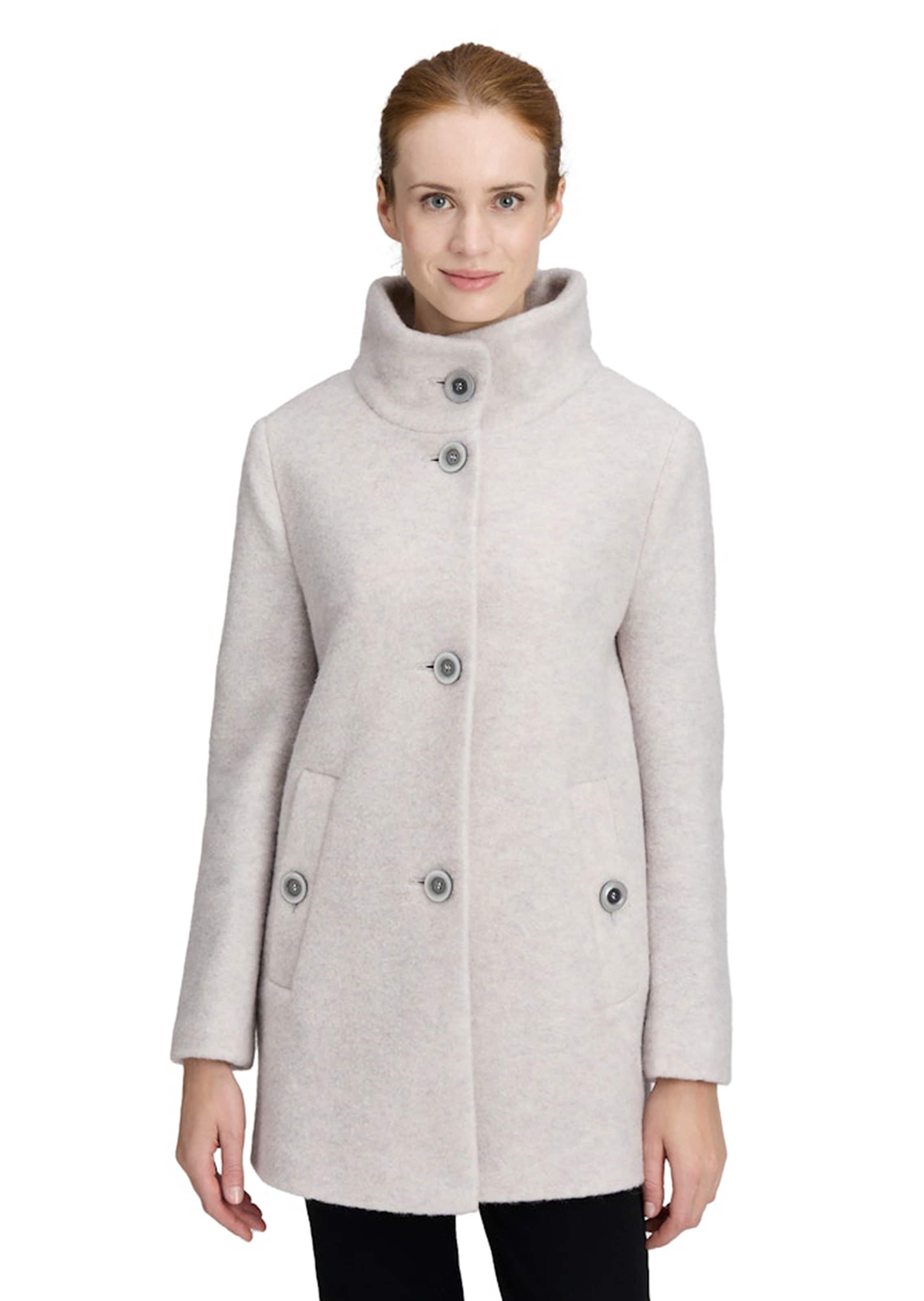 Manteau laineux élégant, avec col montant