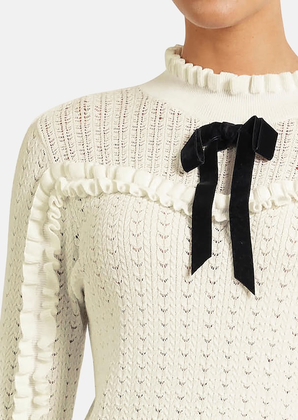 Ajour jumper with ruffles and decorative bow 4